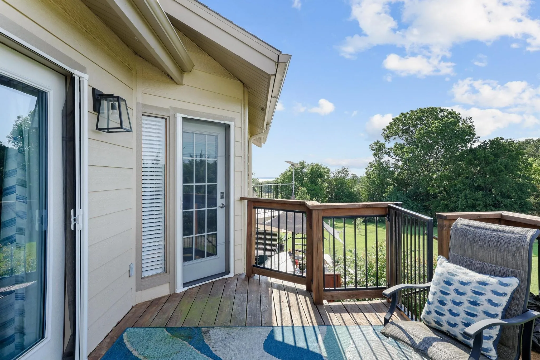 Upper deck off of primary and secondary bedrooms with view of Lake Texoma