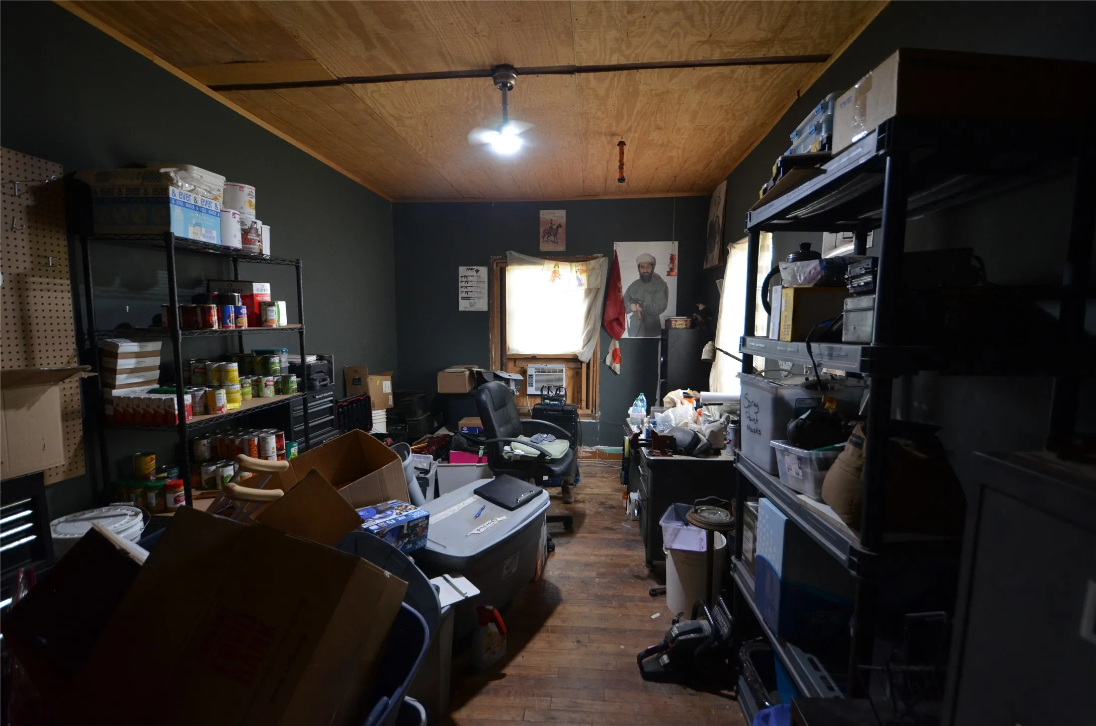 2nd bedroom using for gun room and office.