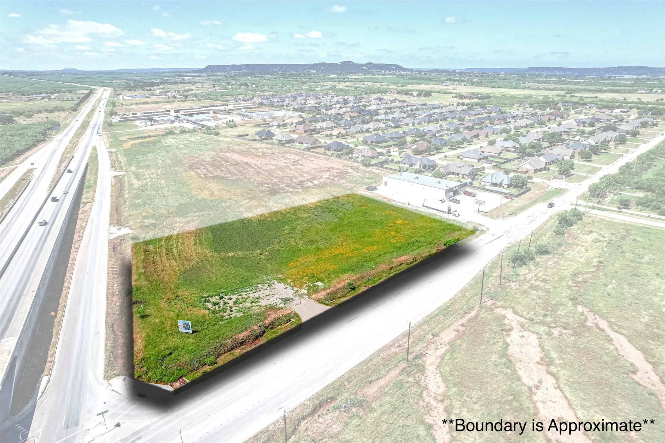 2± Acre Option - prime corner with direct access from highway exit, crossroads to multiple areas of Big Country, and an increased need for development in this exact area!
