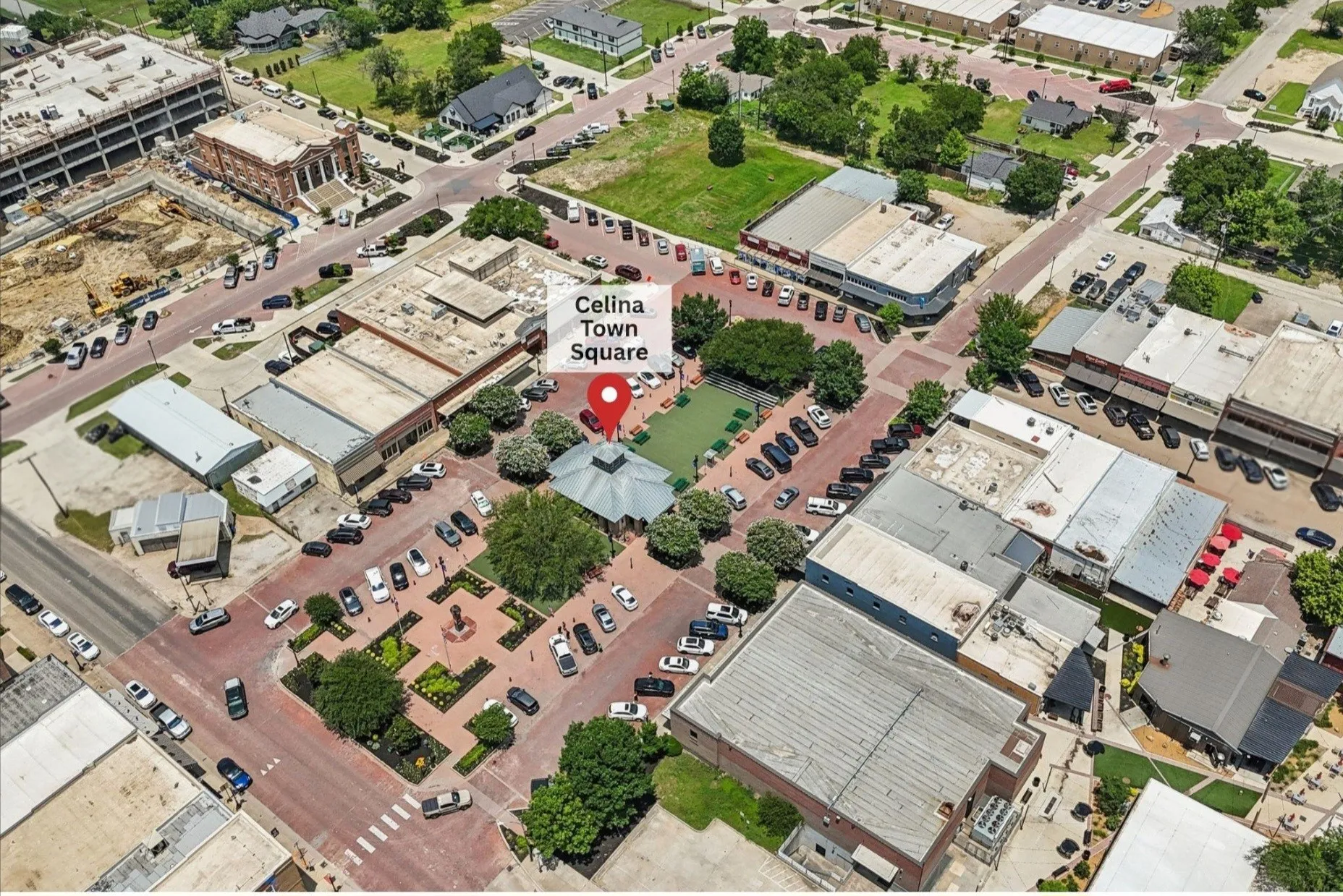 Aerial perspective of Celina Town Square, showcasing a central gazebo and surrounding green spaces