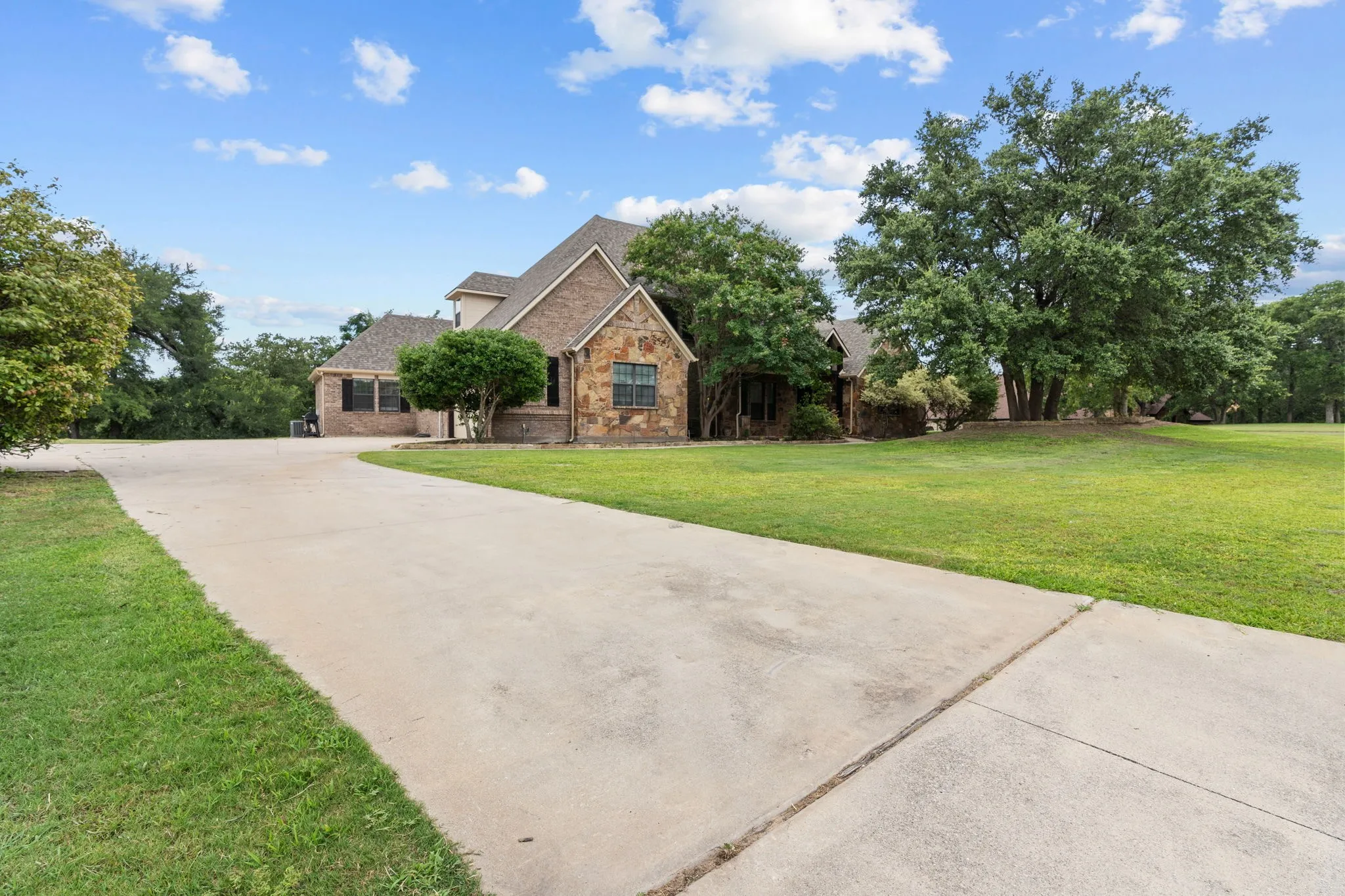 View of front of property with a front yard