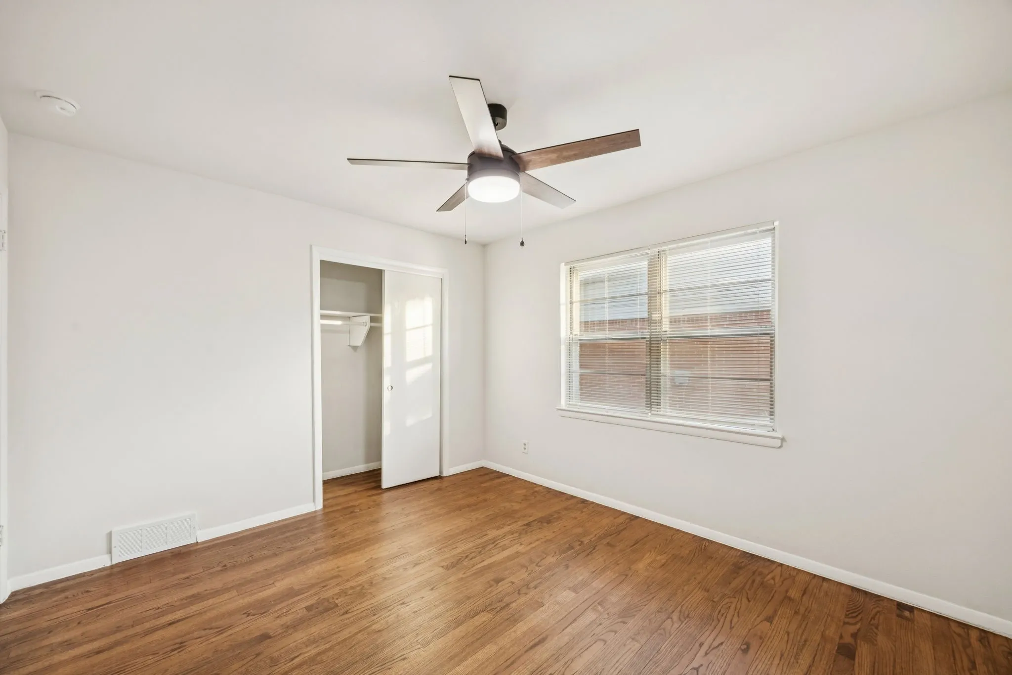 One of two large secondary bedrooms with great sized closets and tons of natural light