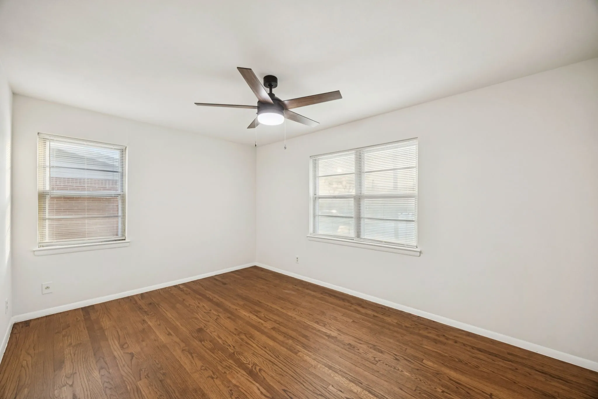 One of two large secondary bedrooms with great sized closets and tons of natural light