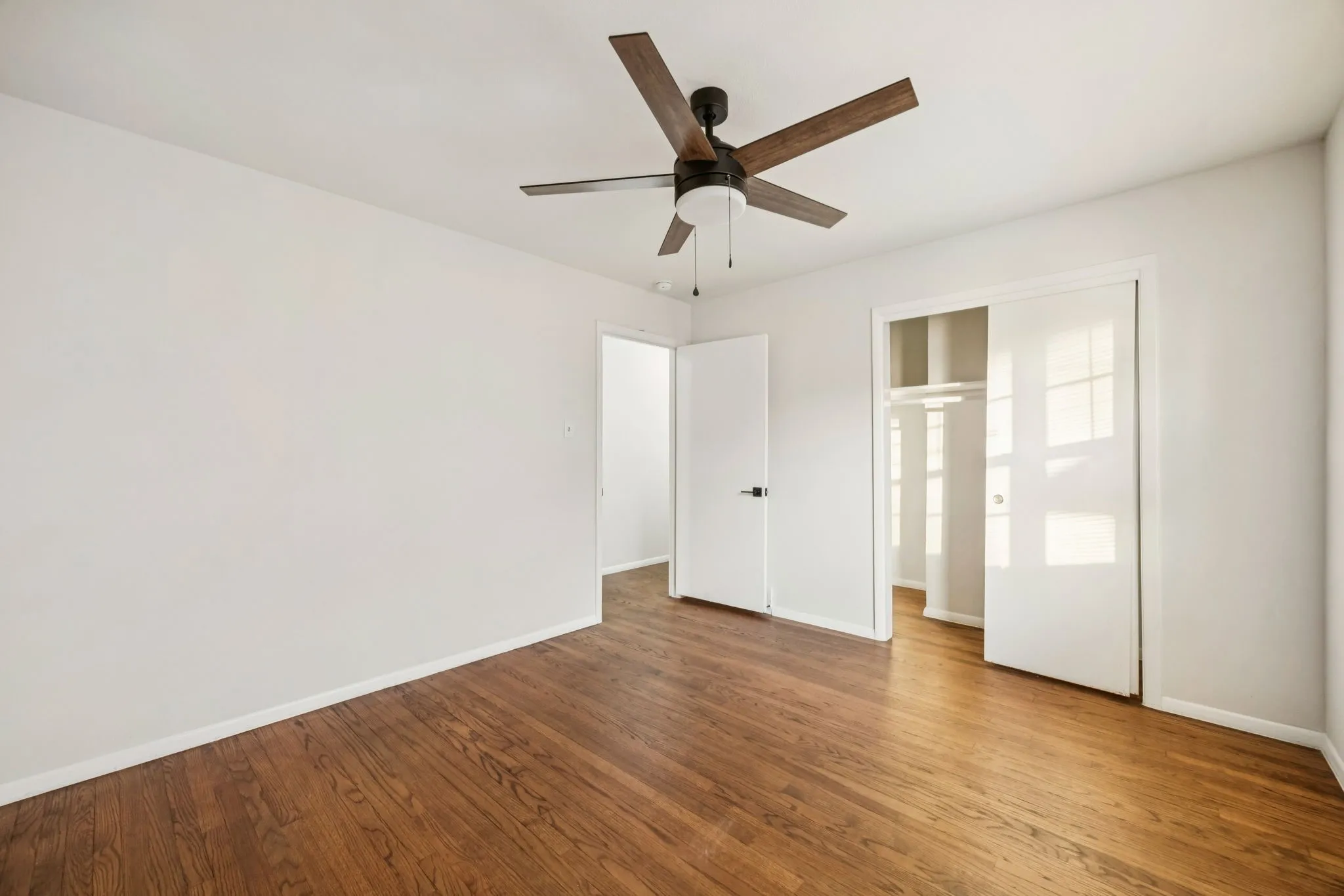 One of two large secondary bedrooms with great sized closets and tons of natural light