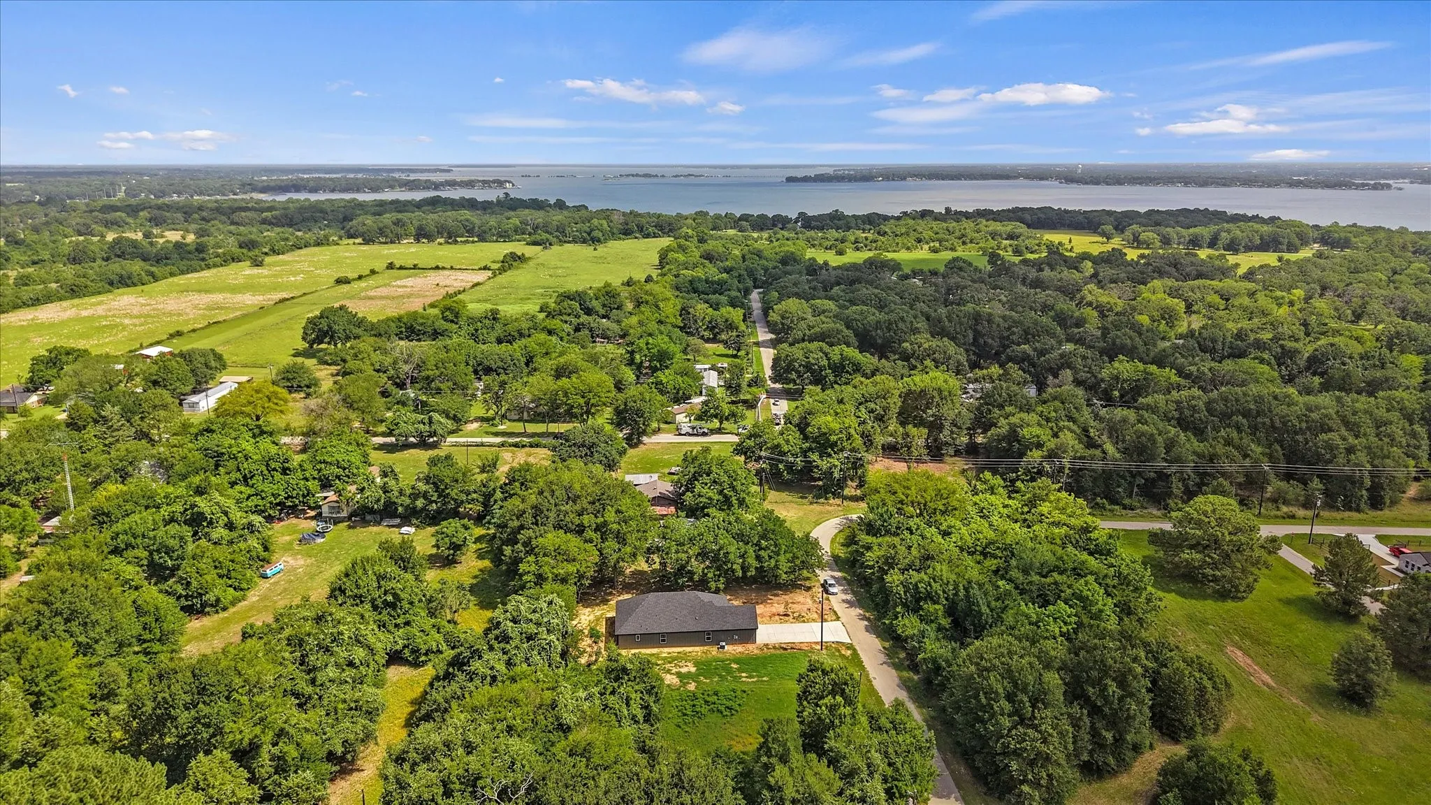 Expansive aerial view shows Cedar Creek Lake