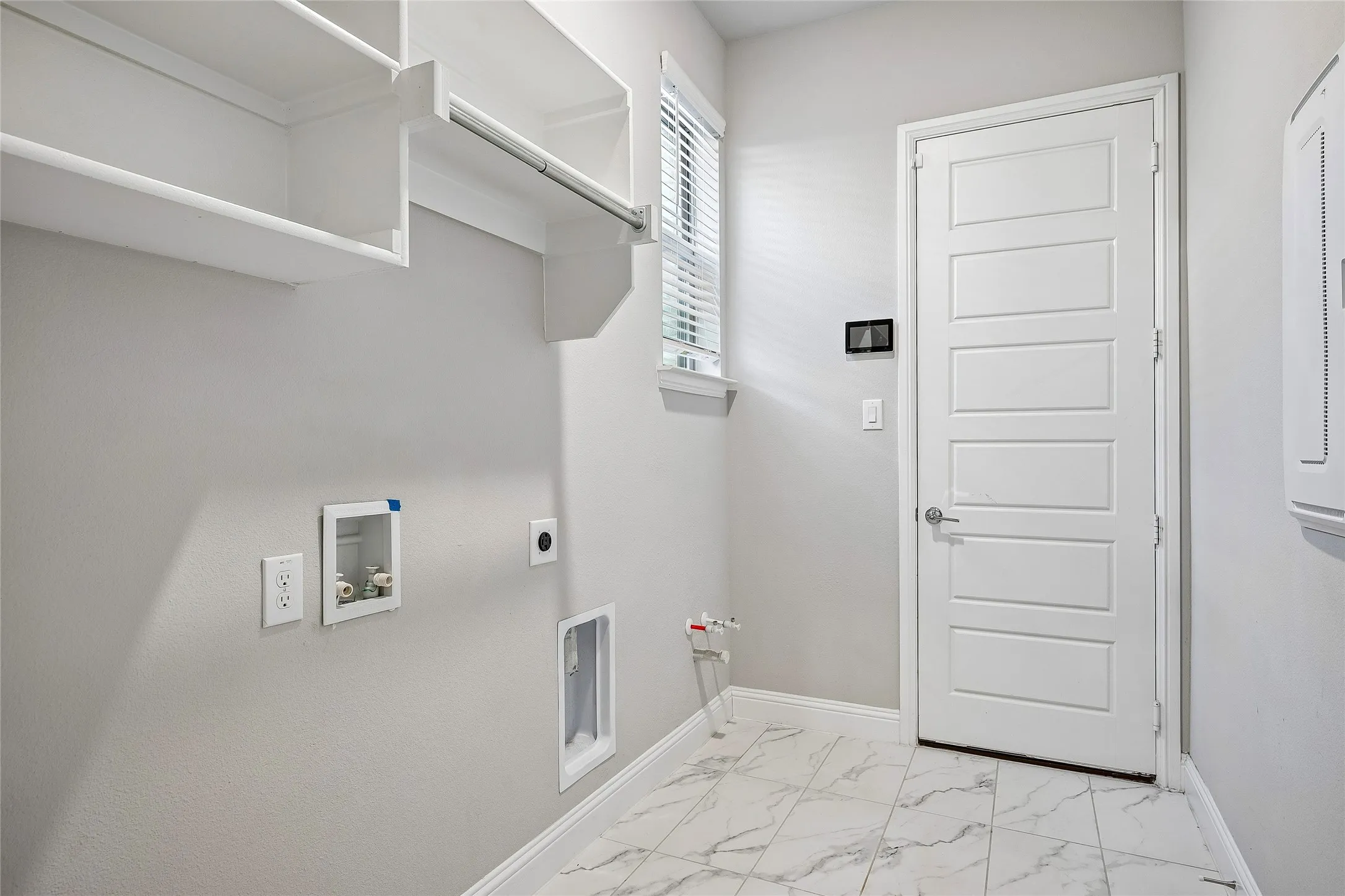 Large Laundry Room with Room for Second Refrigerator