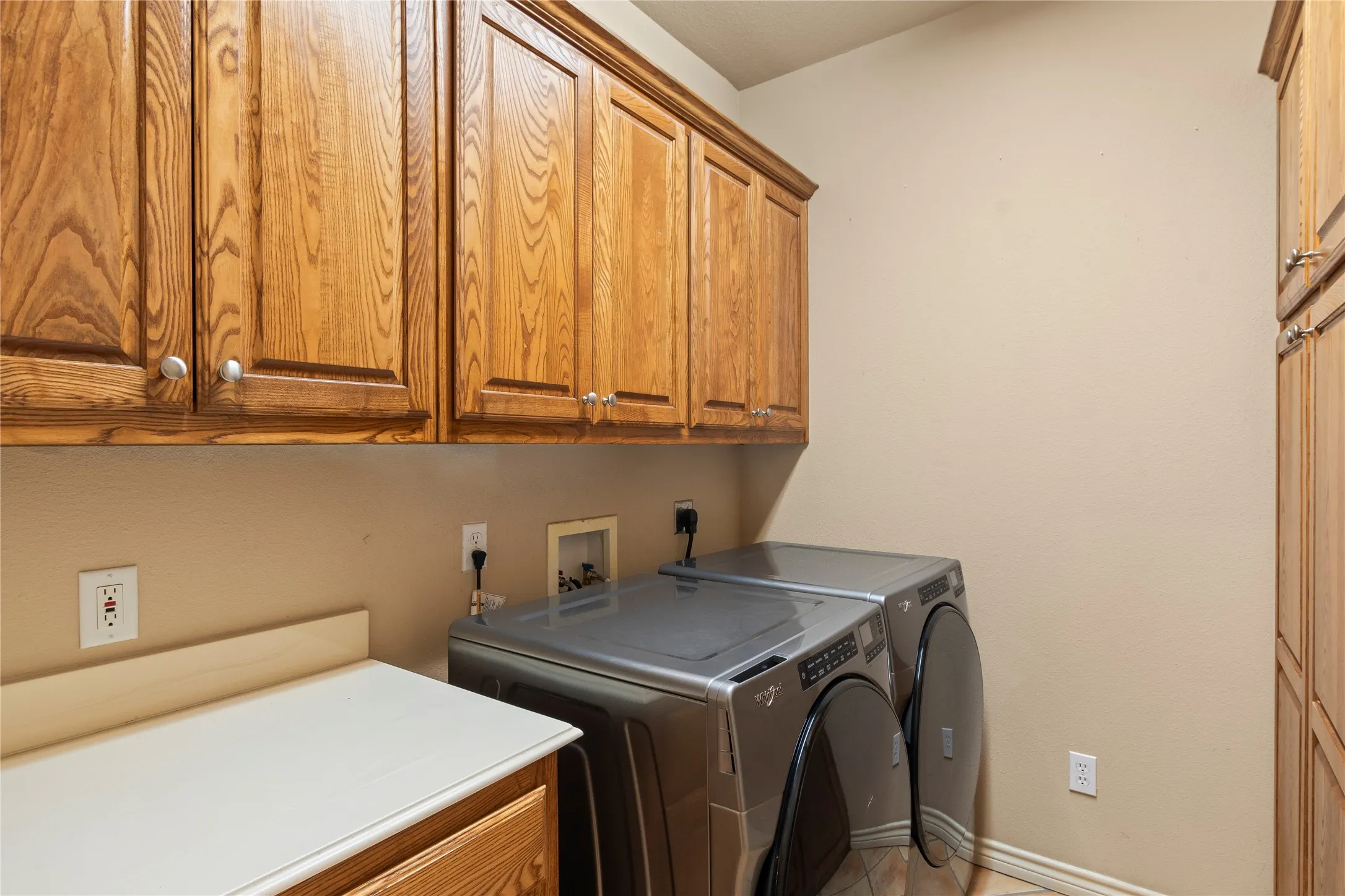 Functional Laundry Room with Storage Space