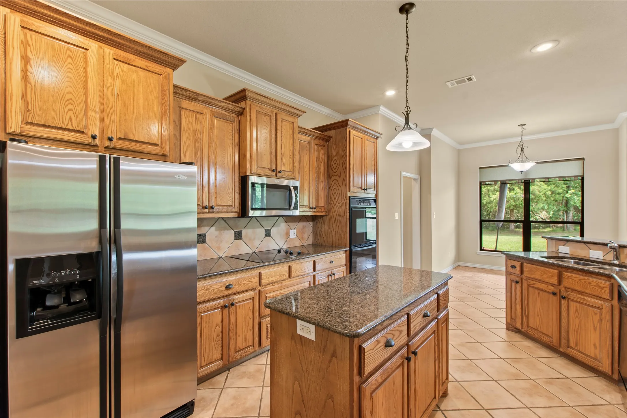 Beautiful Wood Cabinetry and Center Island