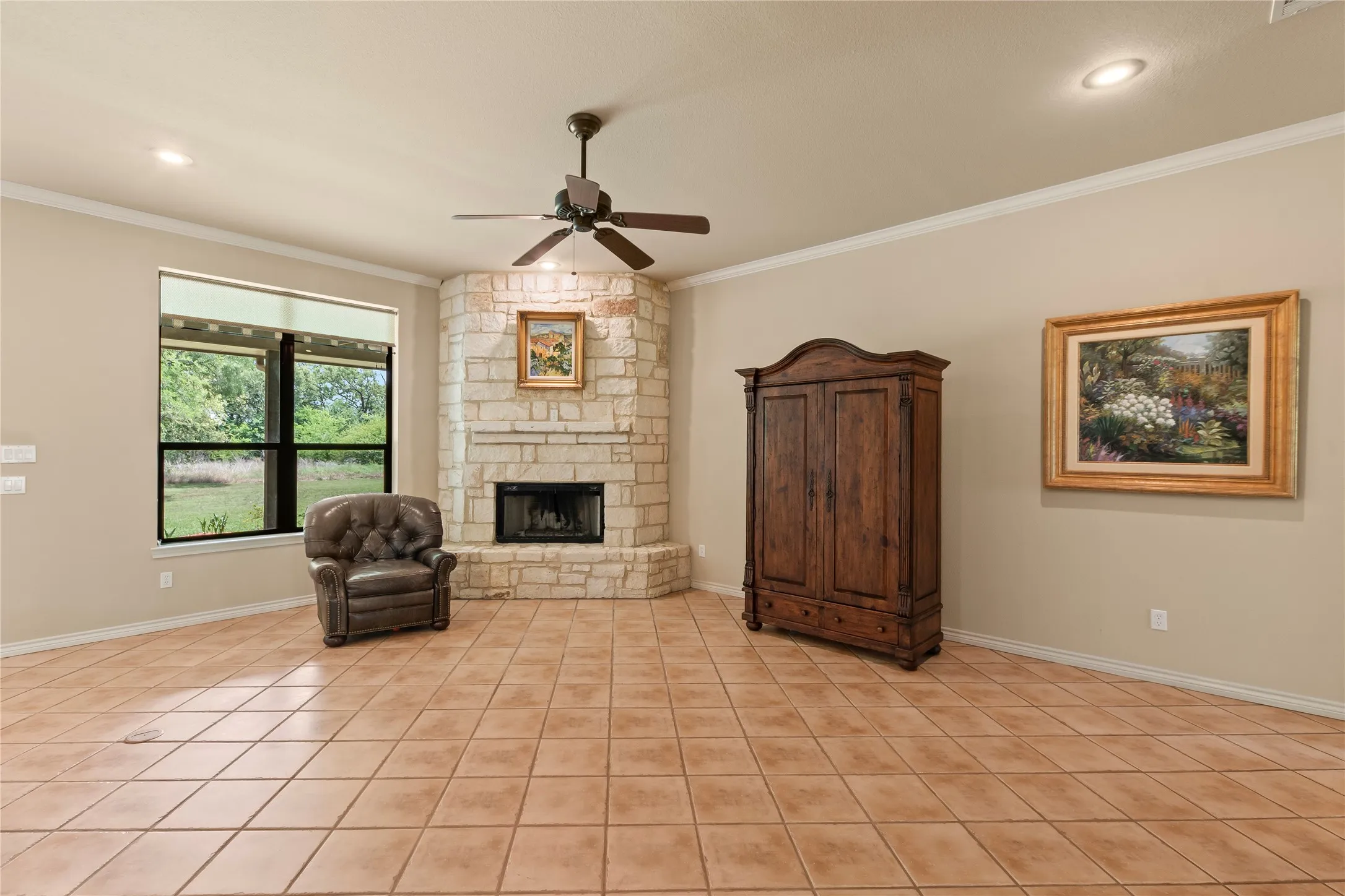 Spacious Living Room with Stunning Stone Fireplace