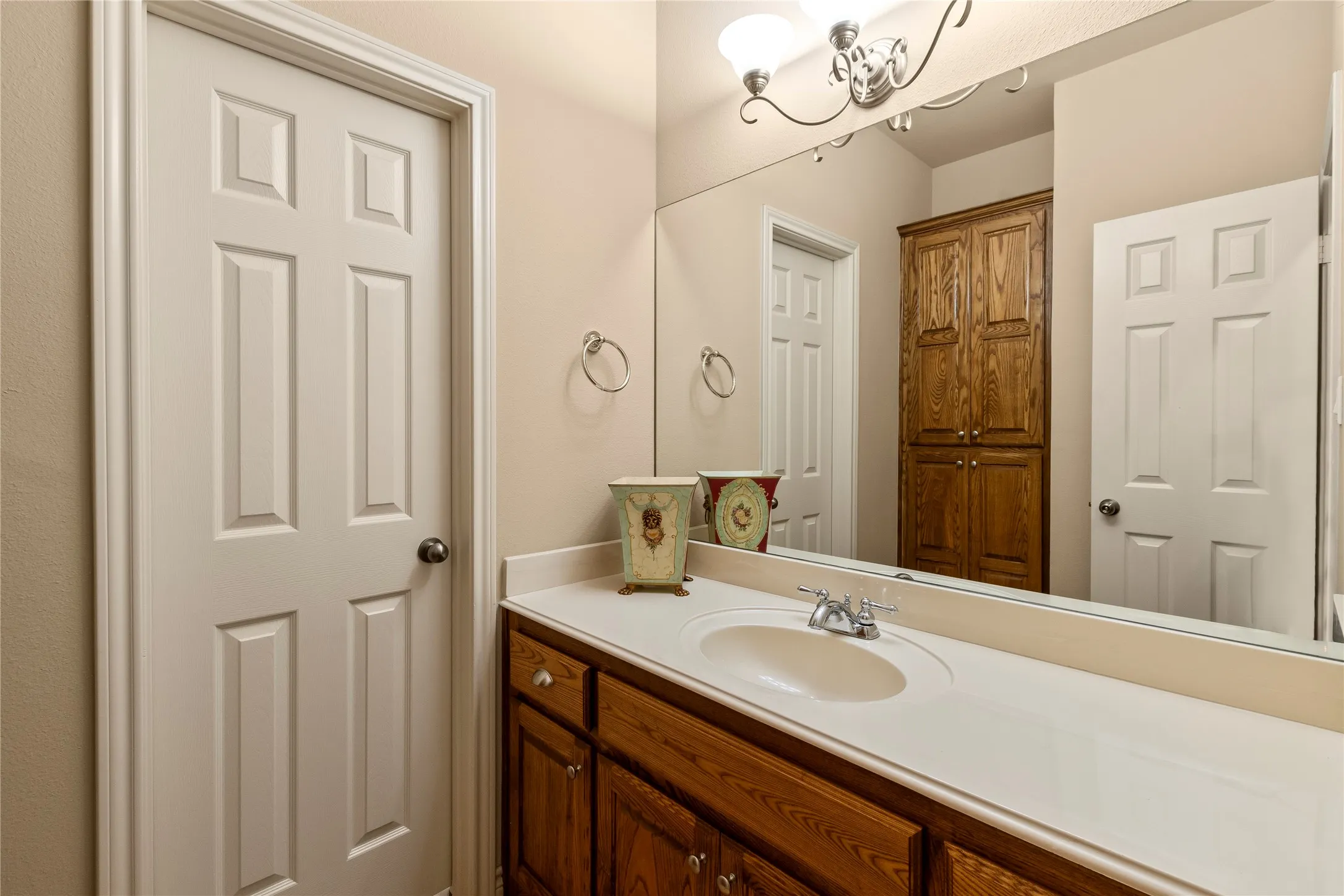 Guest Bathroom with Convenient Hallway Access Featuring Dedicated Vanity Space