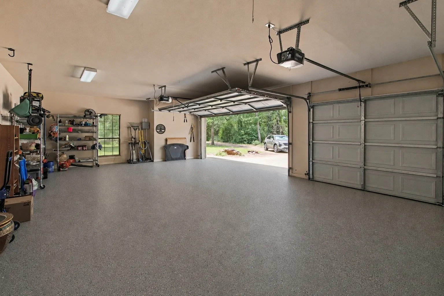 3 Car Garage with Fresh Epoxy Flooring