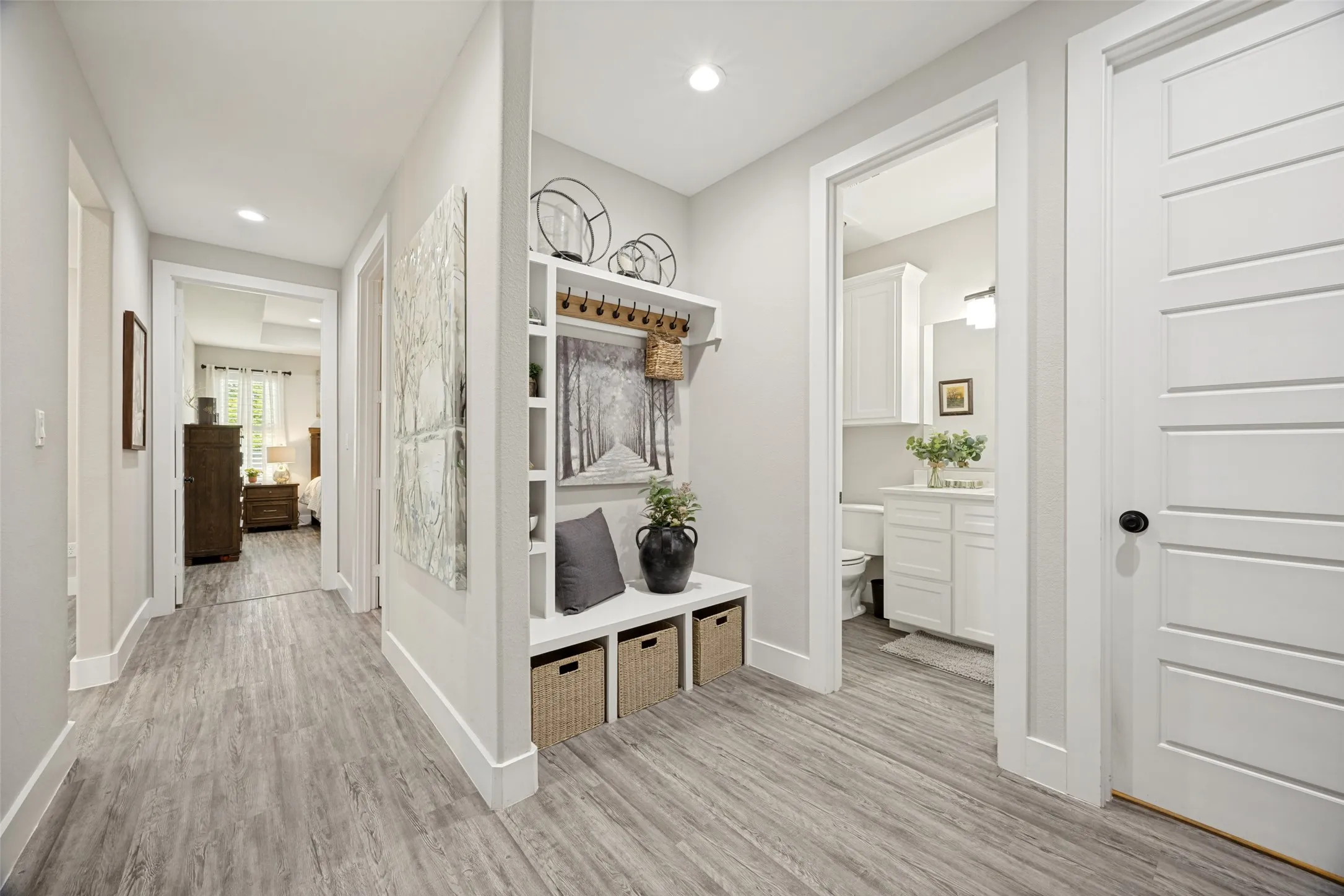 Hallway leading to garage