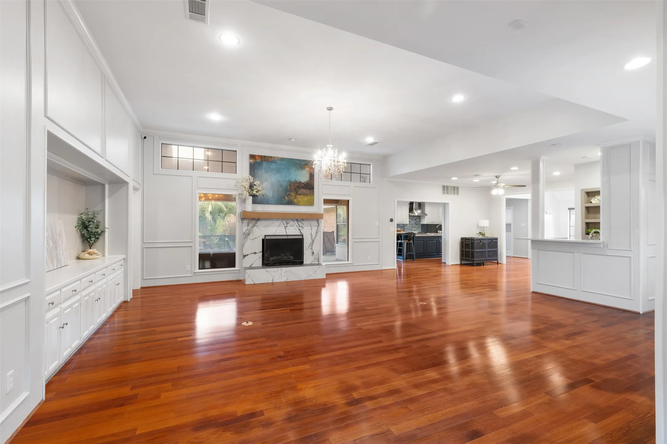 Walking in from foyer into kitchen from main living area.