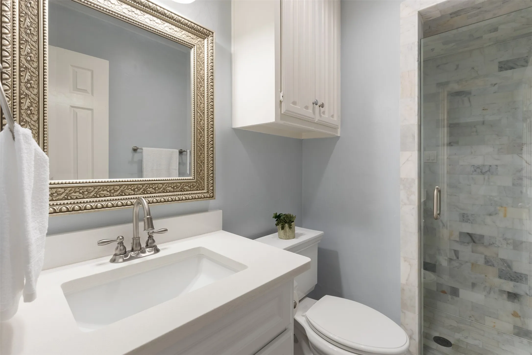 Third full bathroom with shower.