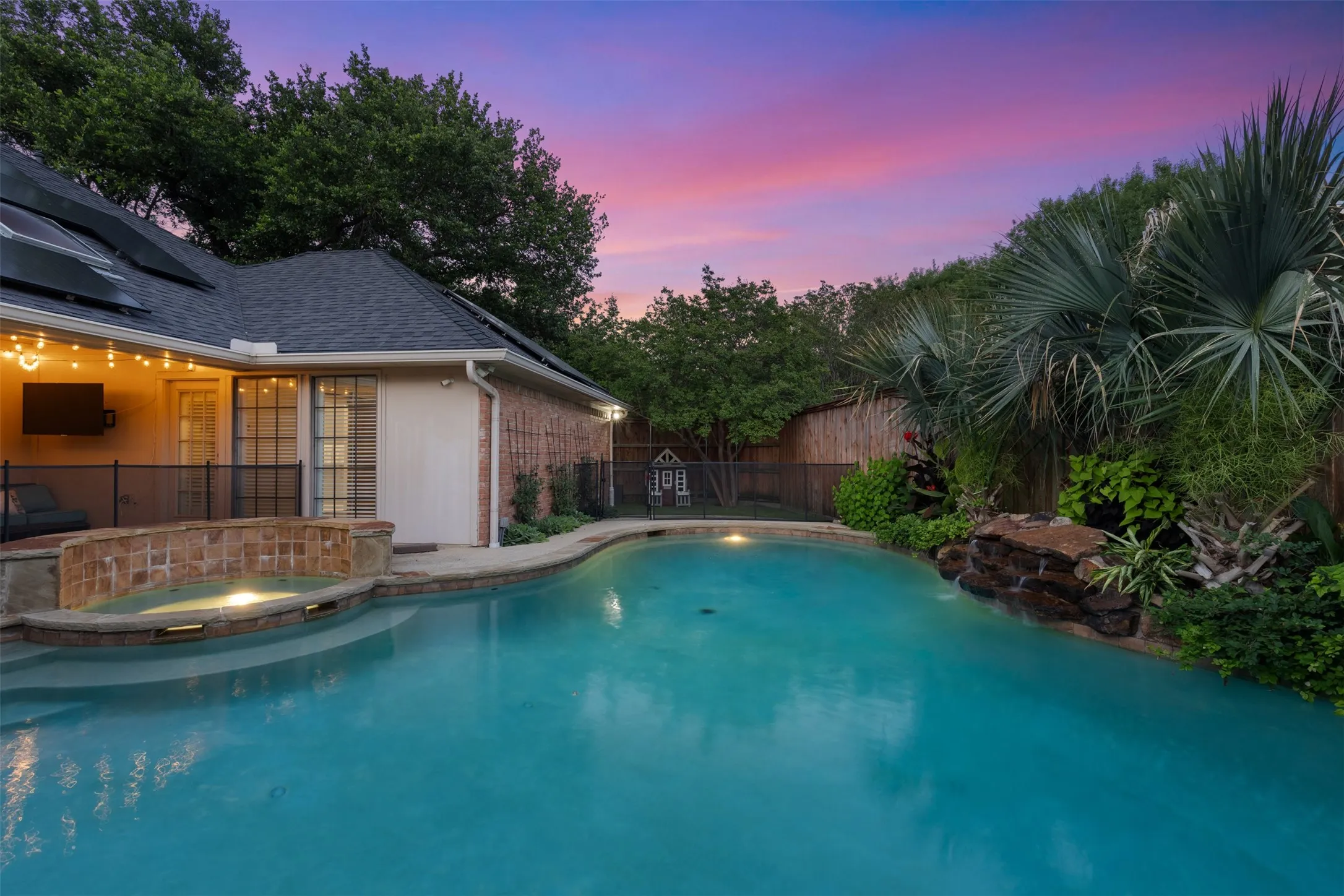 View across pool to large side yard.