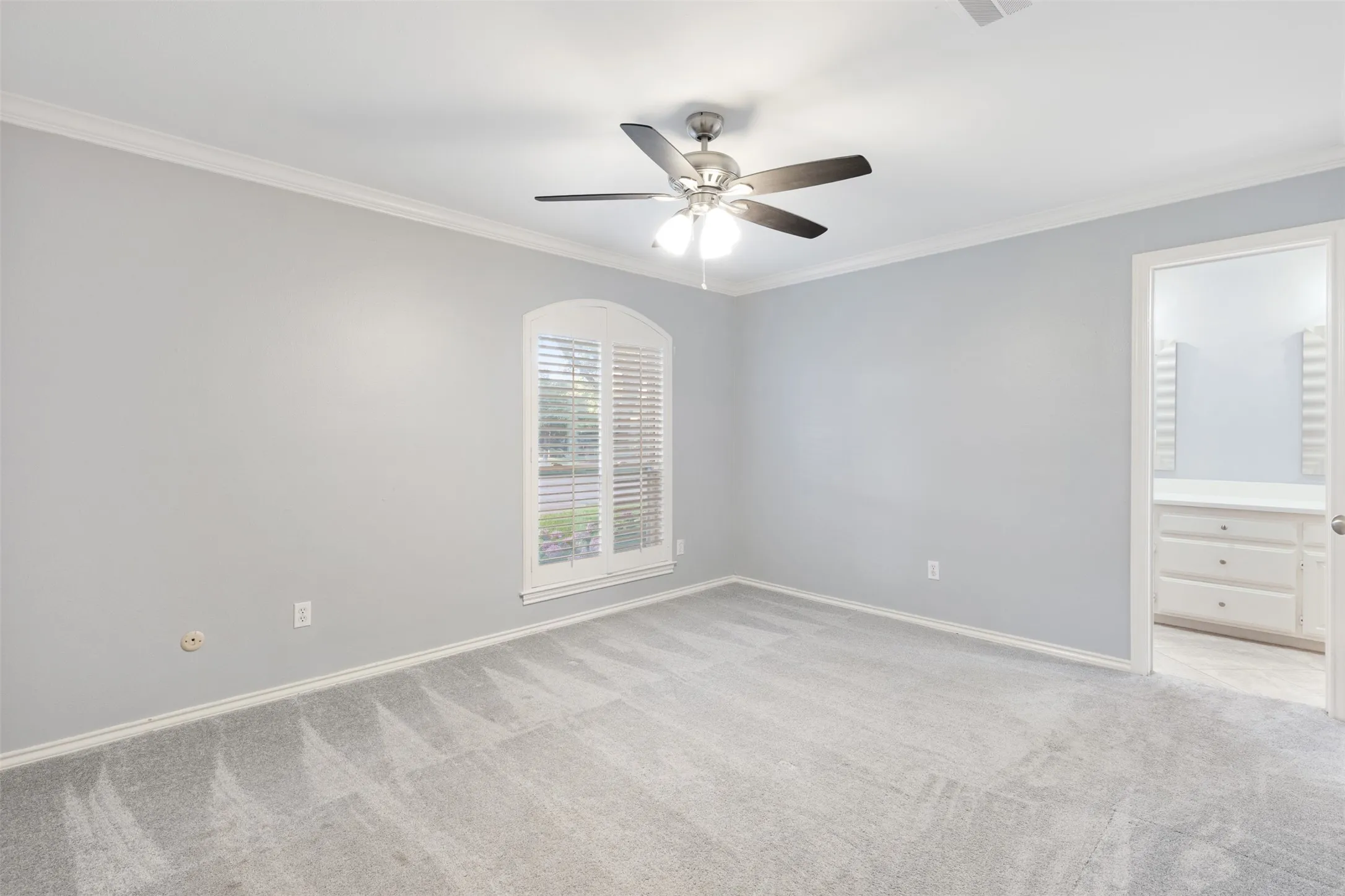 Front bedroom with view into Jack and Jill bathroom.