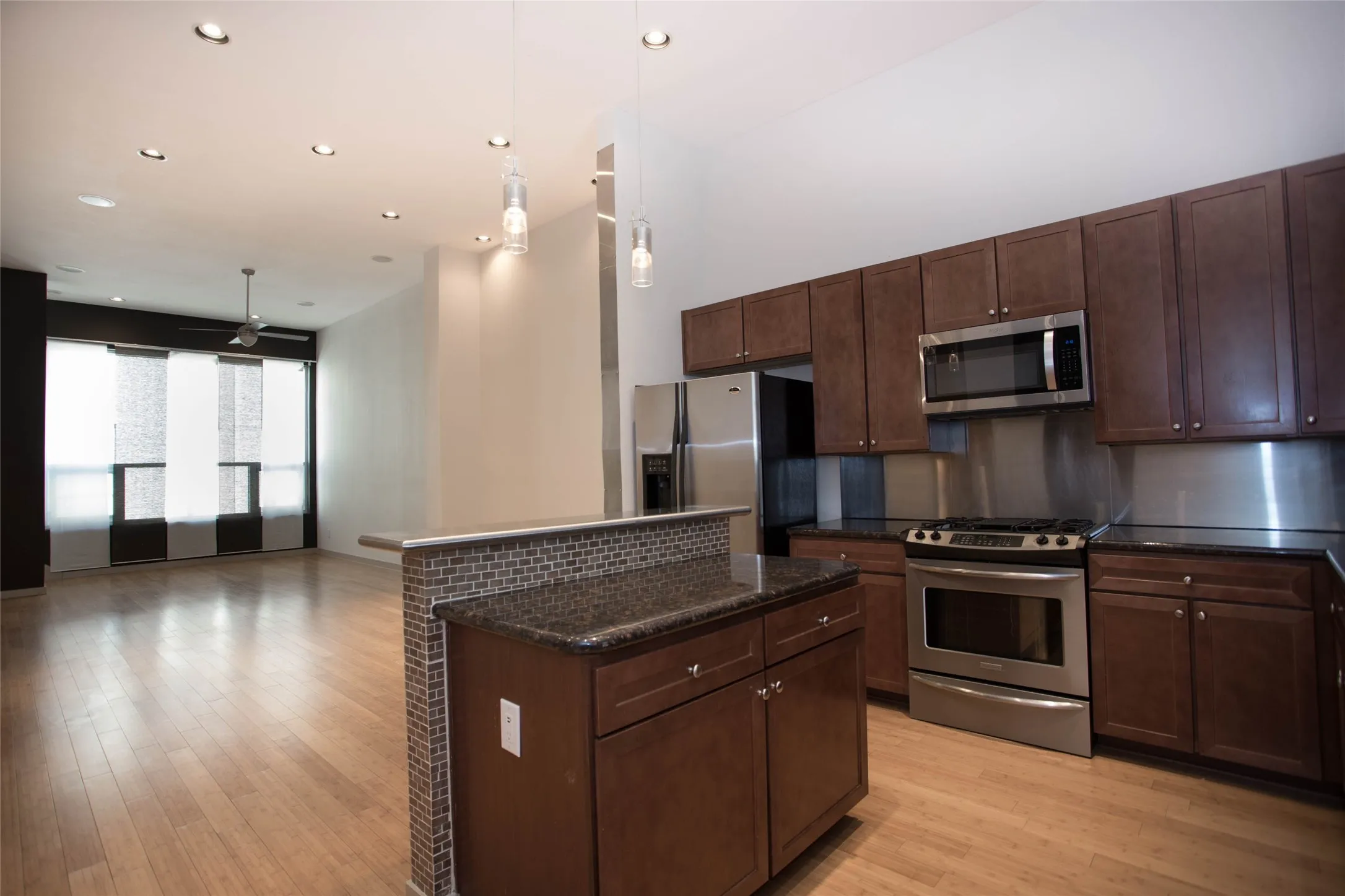 Stainless steel appliances and stainless steel backsplash