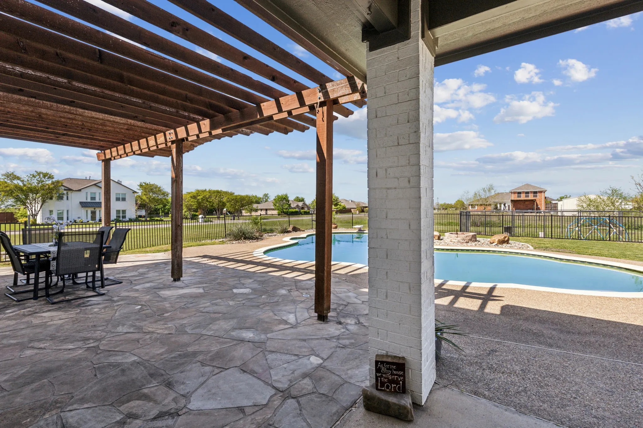 enjoy the shade and view of your amazing backyard! So much room for outdoor seating and entertaining.