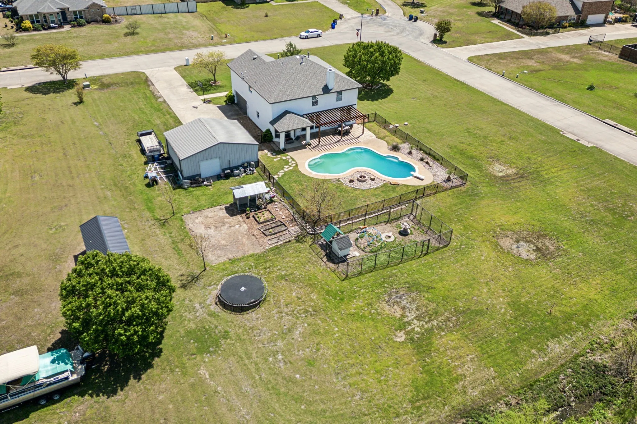 Look at all that could be yours! It's another hot summer! Cool off in your own backyard. Plus, two story home, workshop, large fenced backyard, and chicken coup!