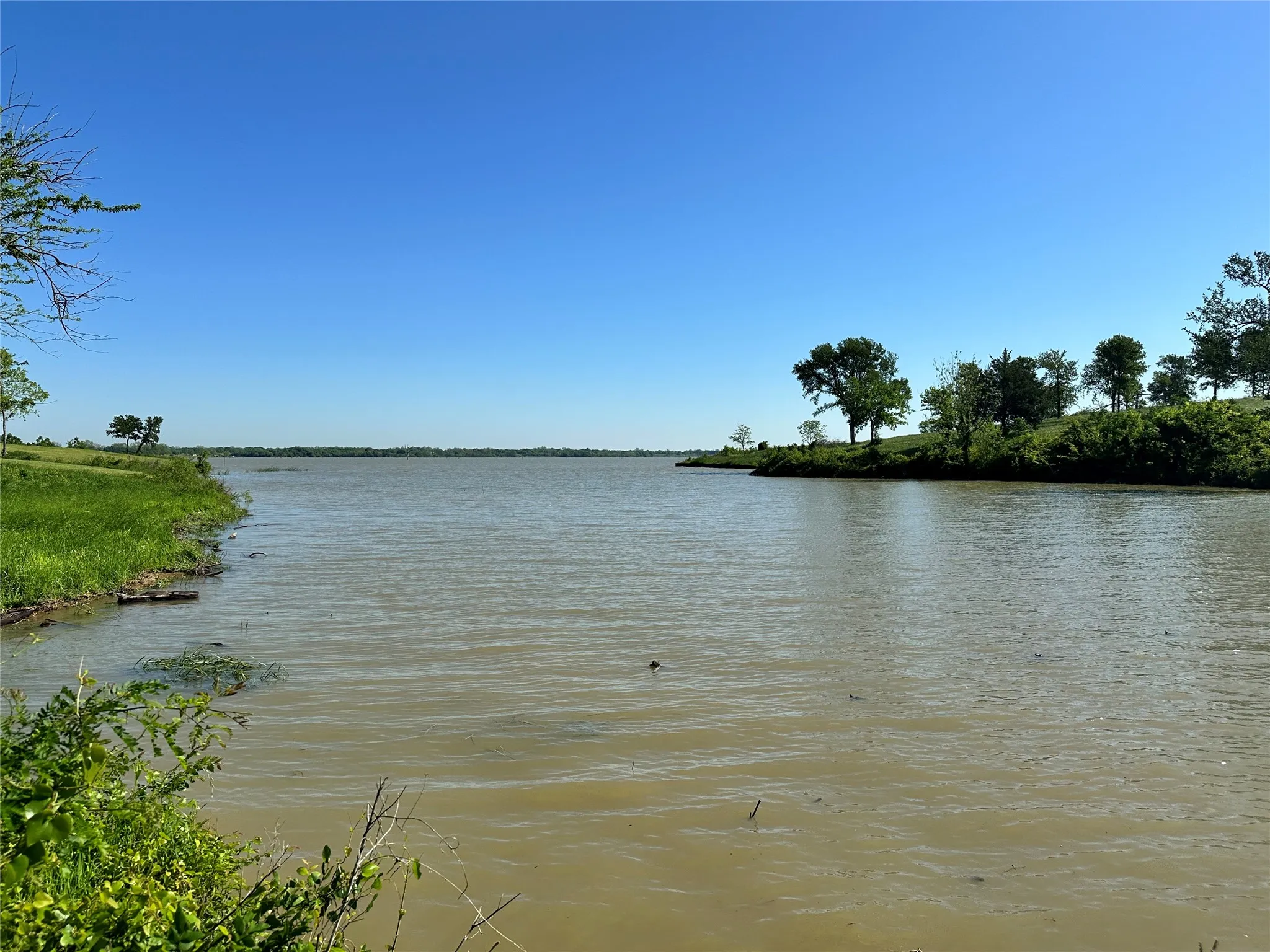 Natural shoreline and lake views make this Corsicana waterfront lot a beautiful retreat.