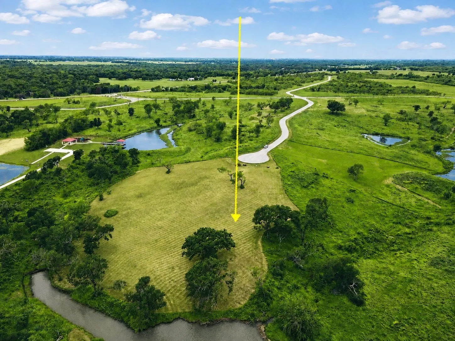 Aerial view captures Lot 53’s lakefront location inside gated Richland Park.