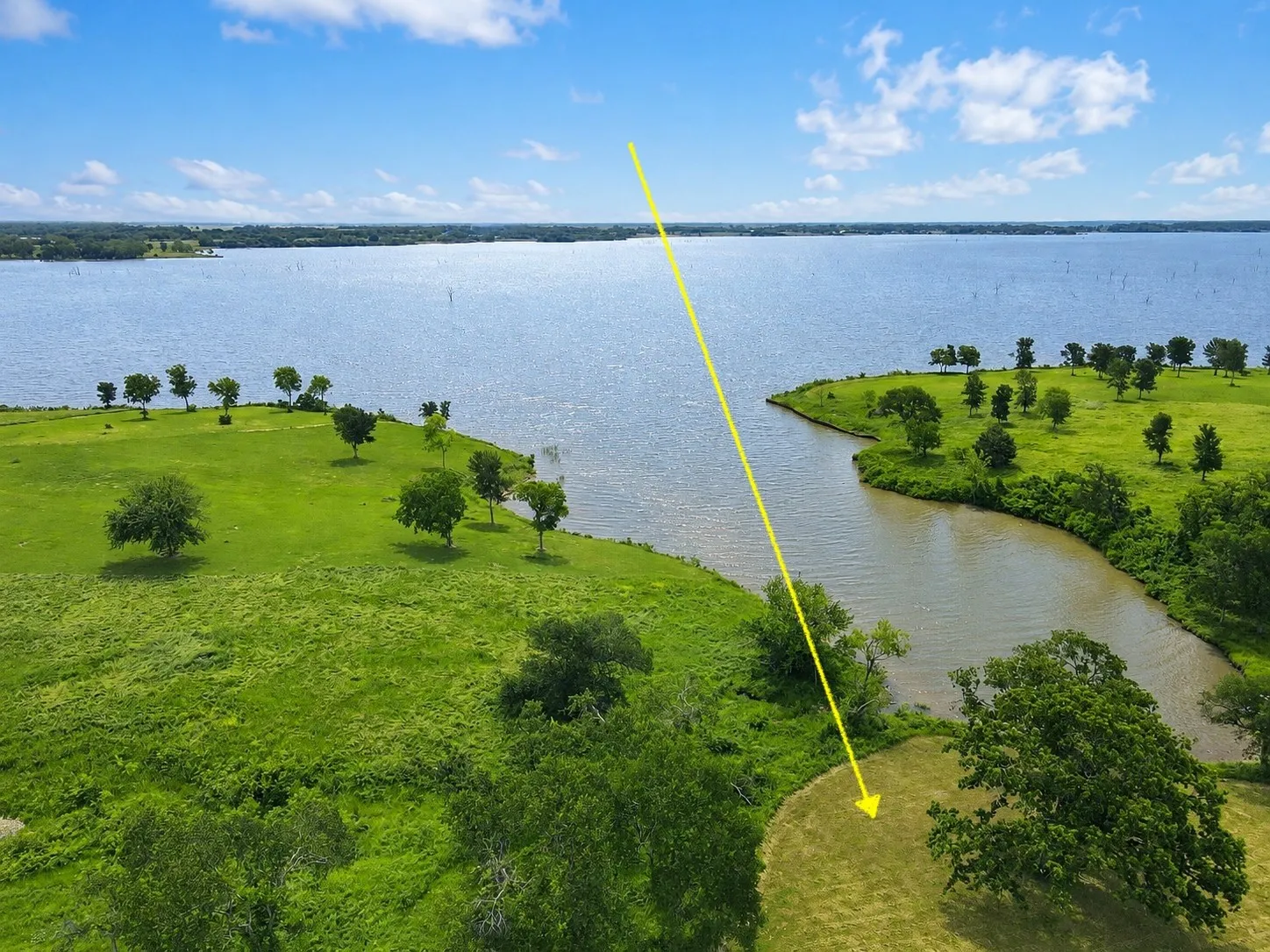 Yellow arrow marks Lot 53, a dock-permitted lakefront homesite in Richland Park.