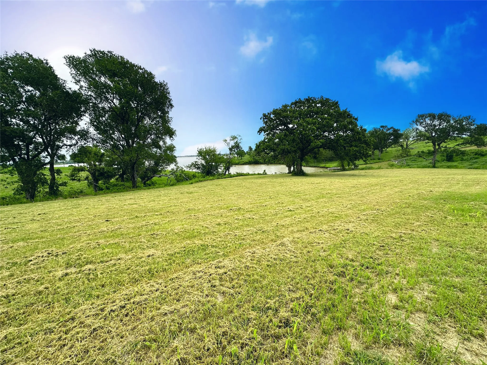 Open build area offers space for a custom waterfront home in gated Richland Park.