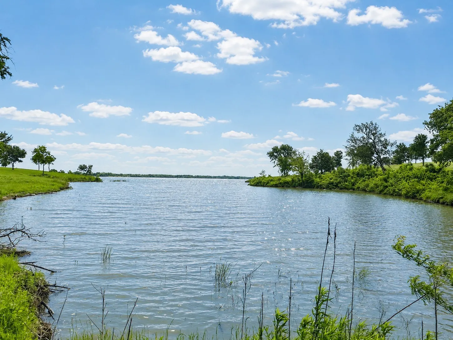 Peaceful Richland Chambers Lake views create the perfect backdrop for a custom waterfront home.