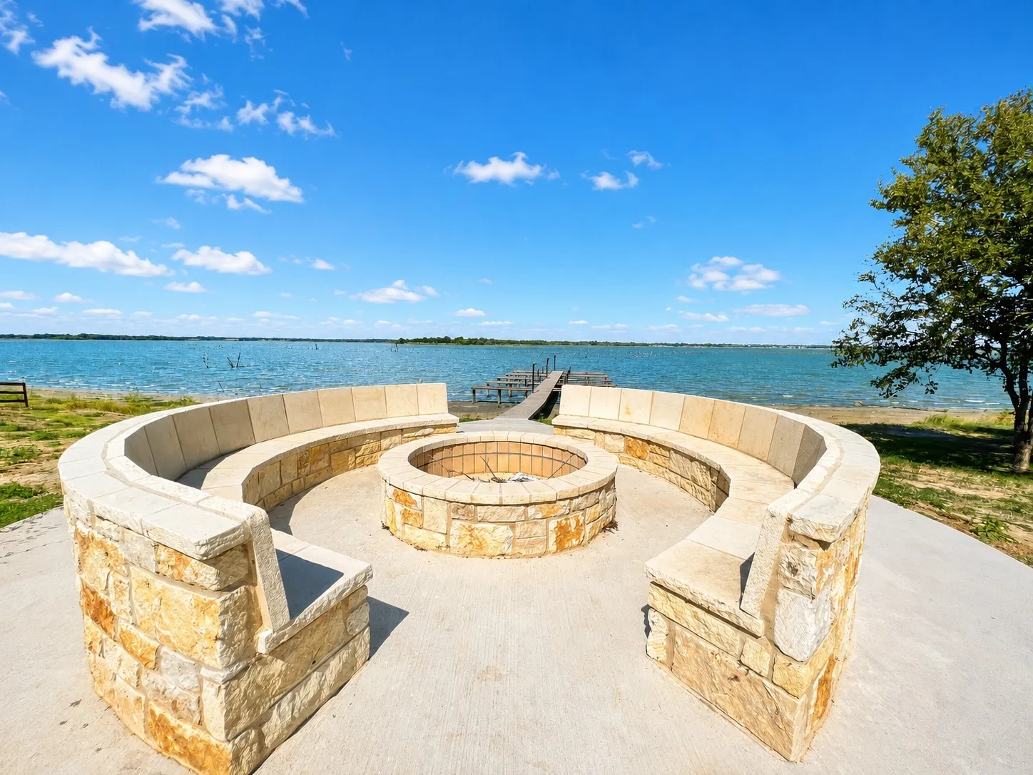 Community fire pit area overlooking the lake for property owners. Great for families or guests.
