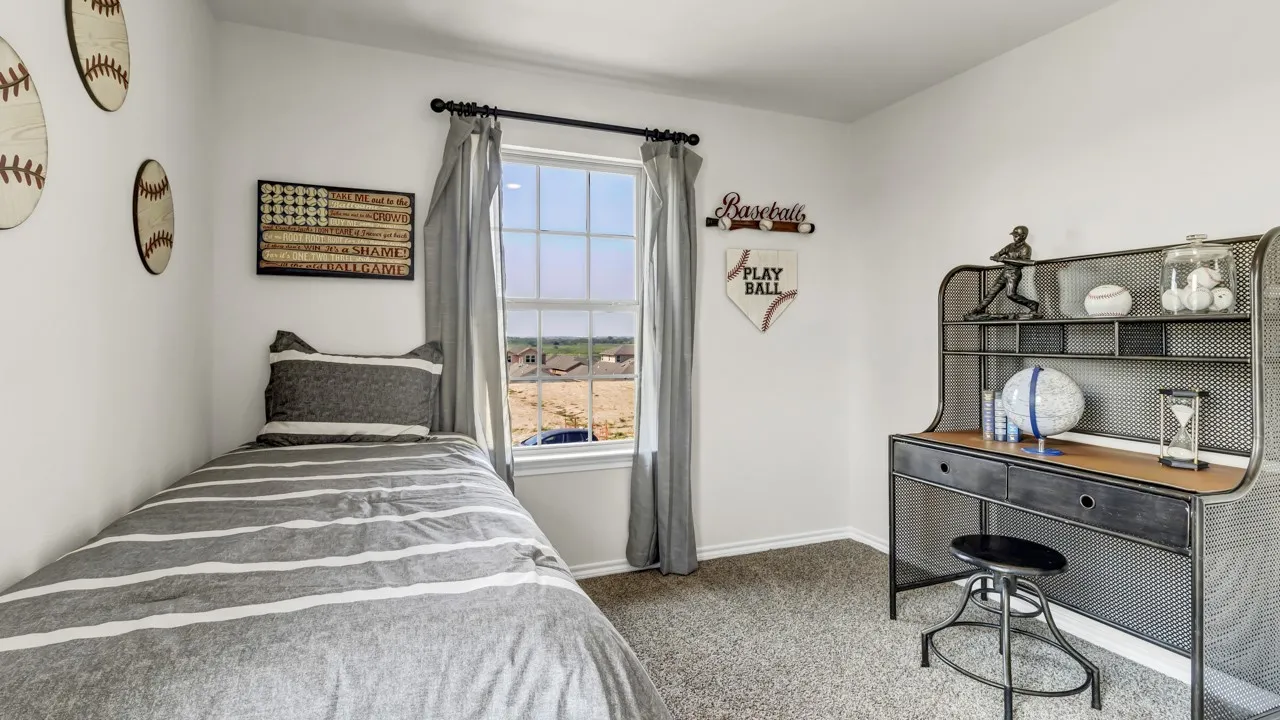 Bedroom featuring a double-hung window, light gray carpeting, crisp white walls, and a recessed ceiling