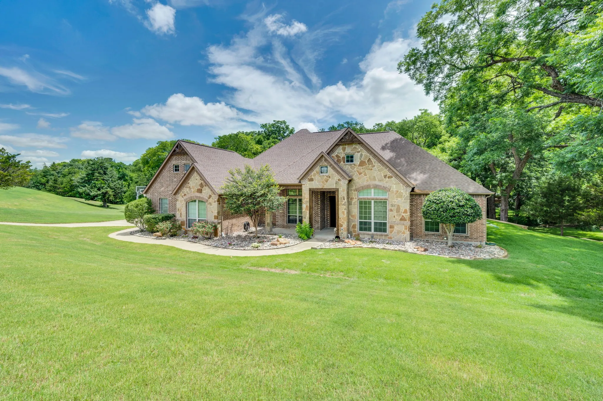 Well manicured lawn with french drain