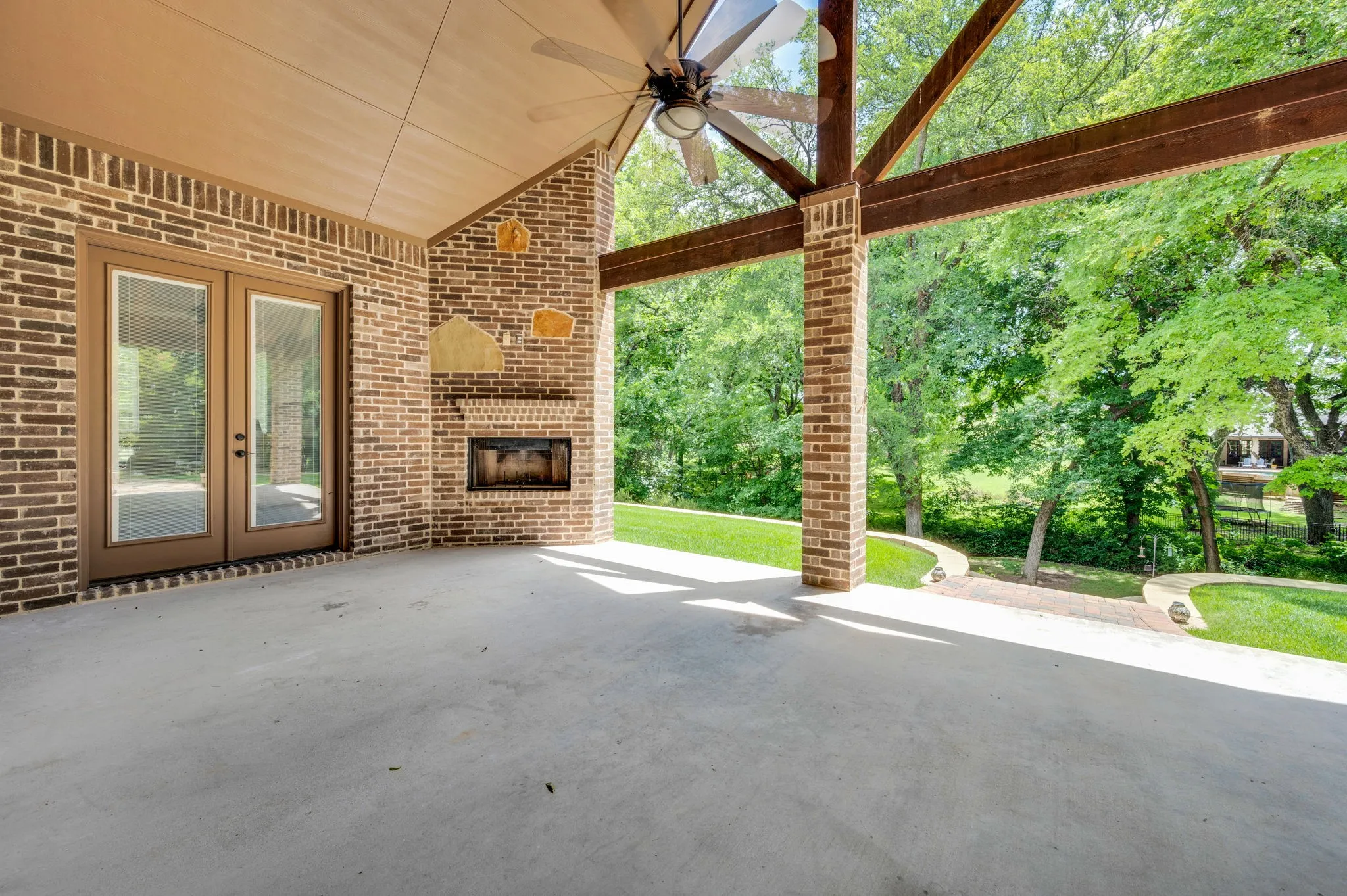 Oversized patio with access to primary bedroom