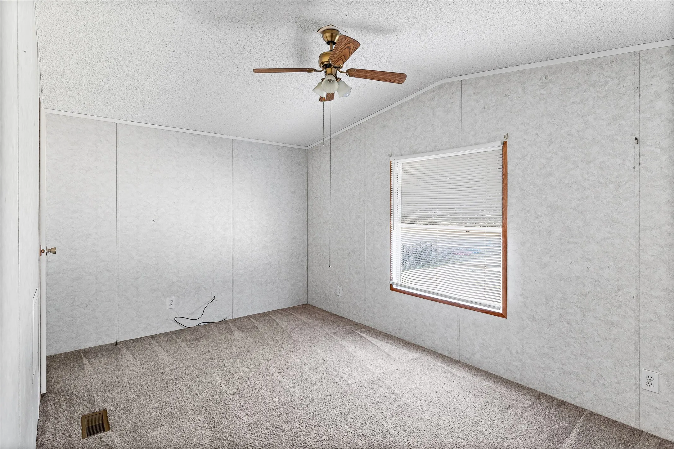 Wall paneling with vertical seams and a central window