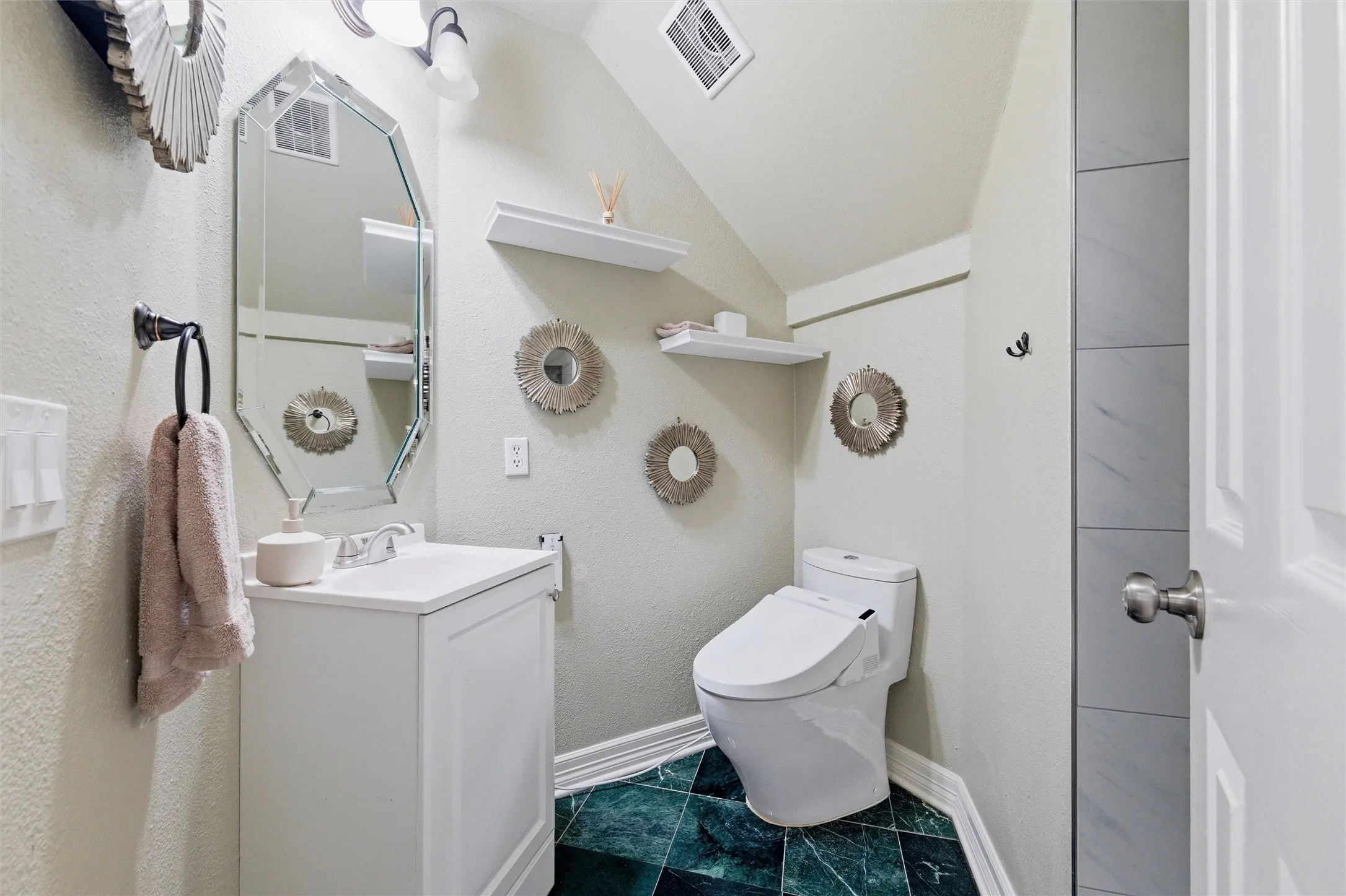 Downstairs Full Hall Bathroom across from BdRm 2