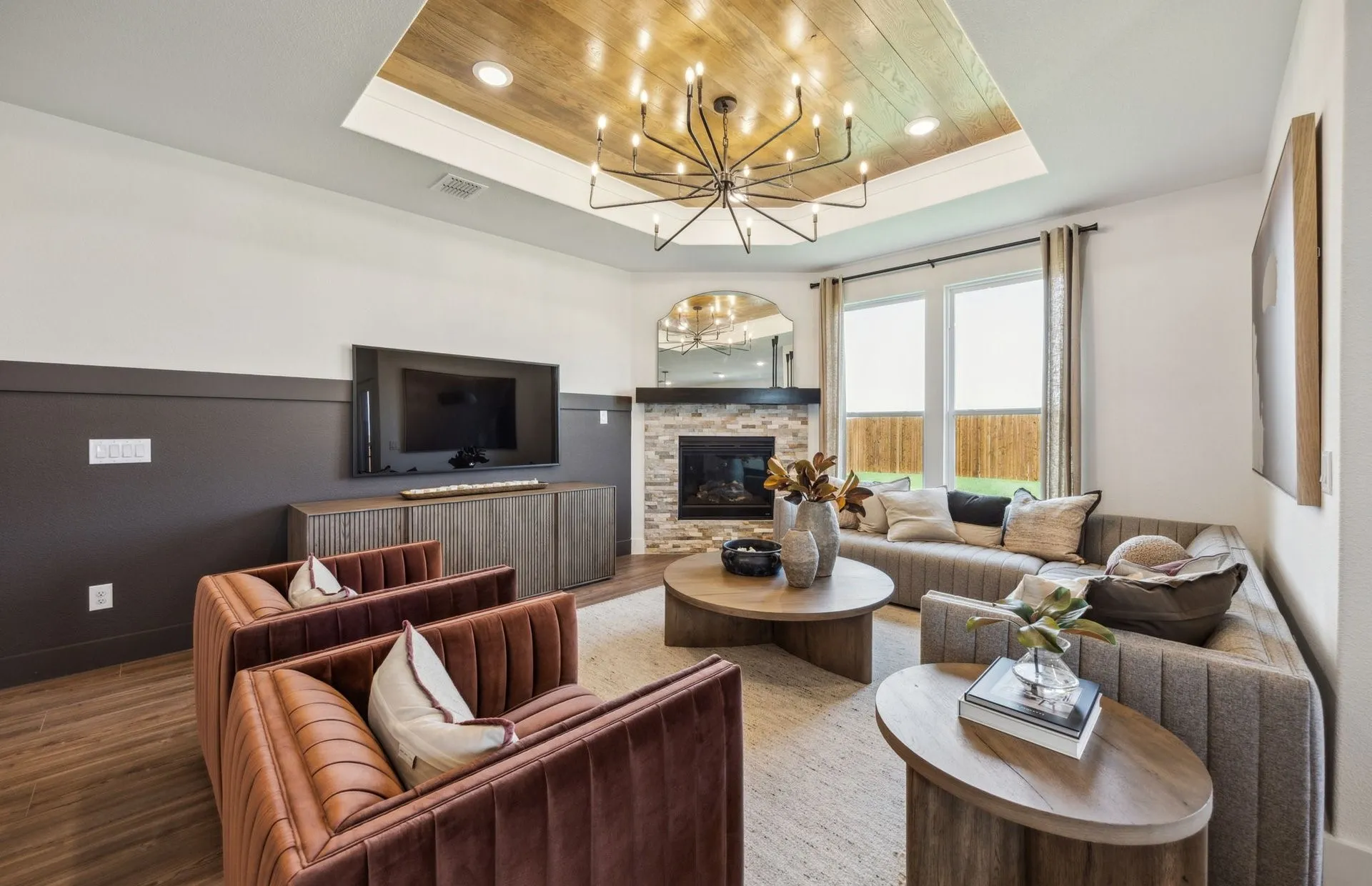 *Model Representation - Spacious gathering room with large windows