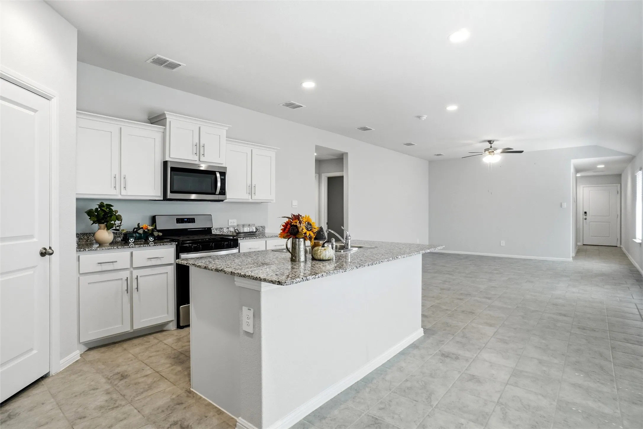 Breakfast Bar with Built Dishwasher and Look There is the Walk-In Pantry