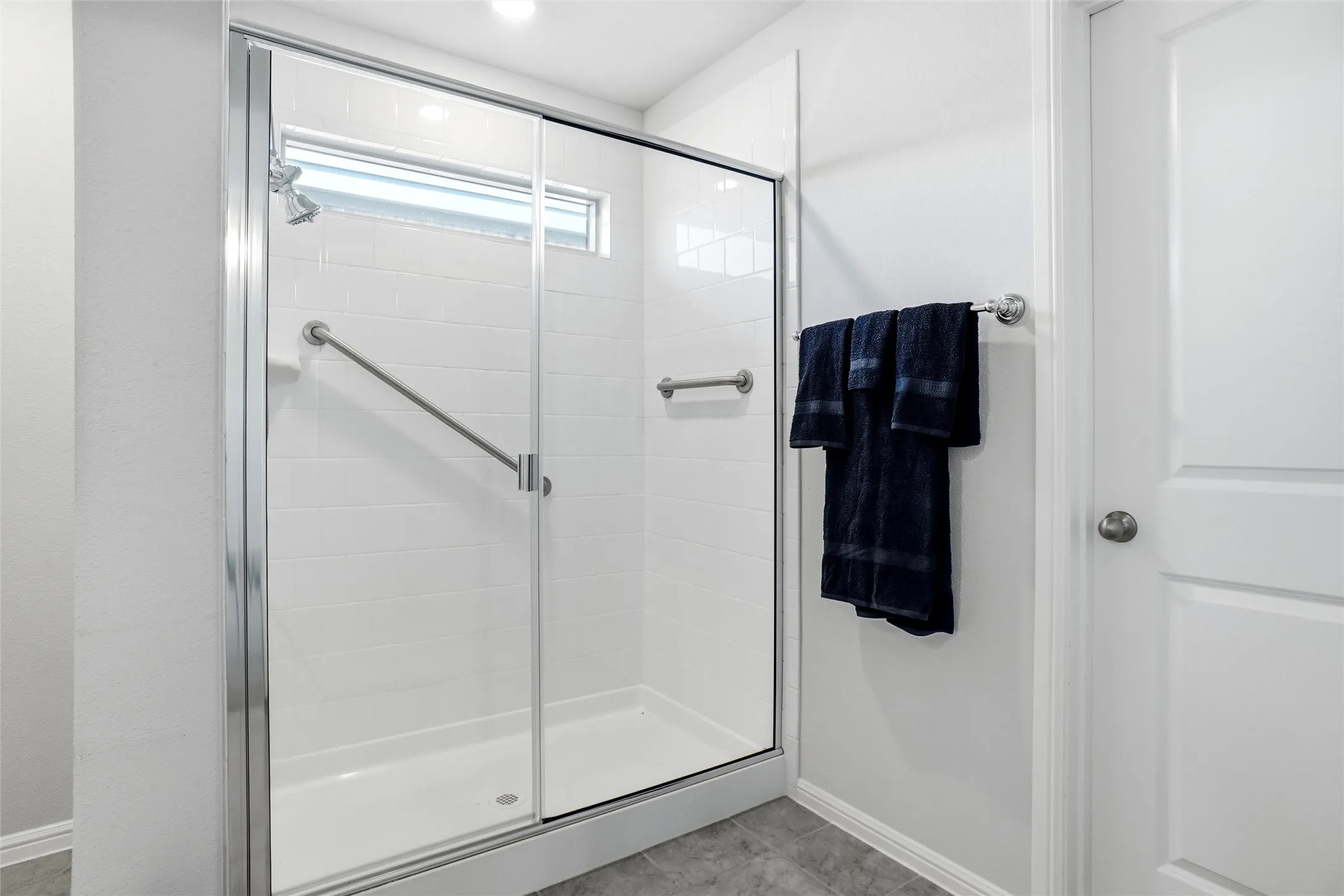 Walk In Shower with Hand Held Shower Head ans glass door