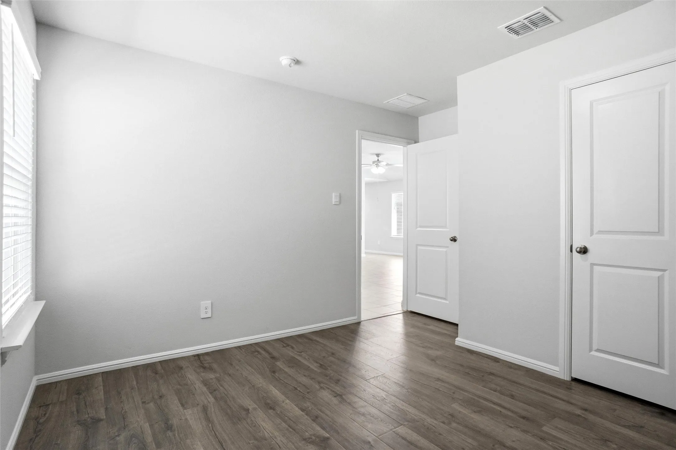 One of 3 Bedrooms with  Wood Vinyl Blank Flooring