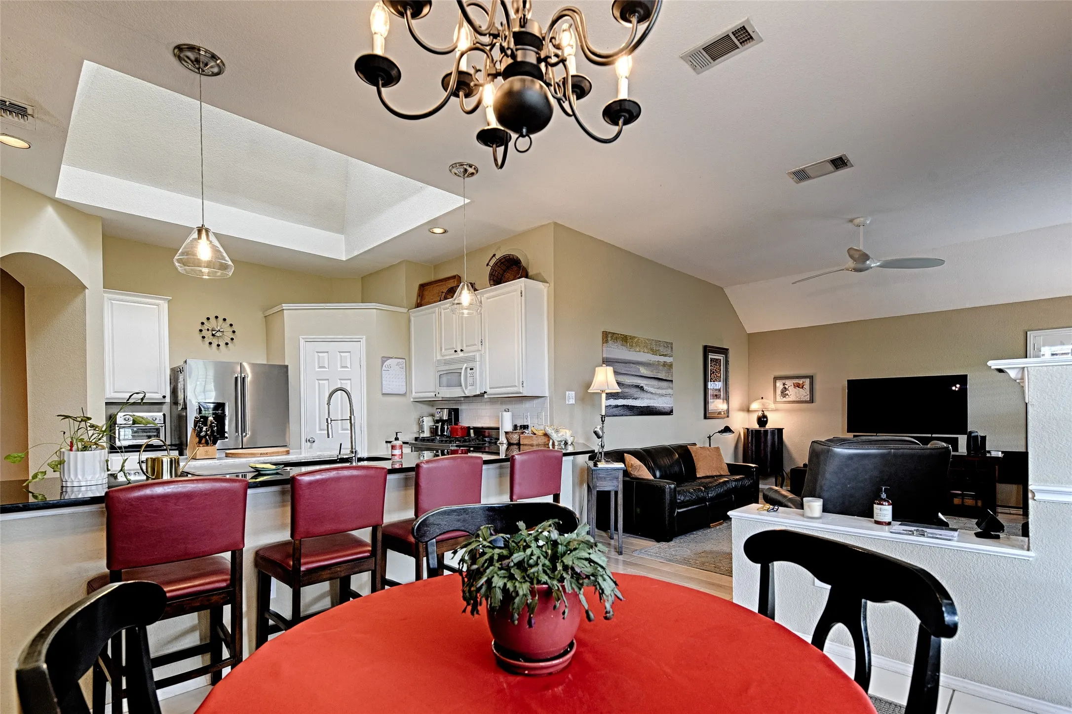 Open concept interior with a vaulted ceiling