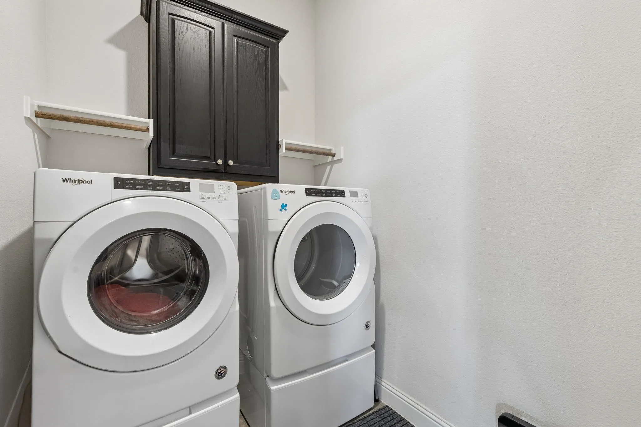 Washer and Dryer in this roomy utility room is negotiable! There is a large storage area in the Utility that you don't want to miss!