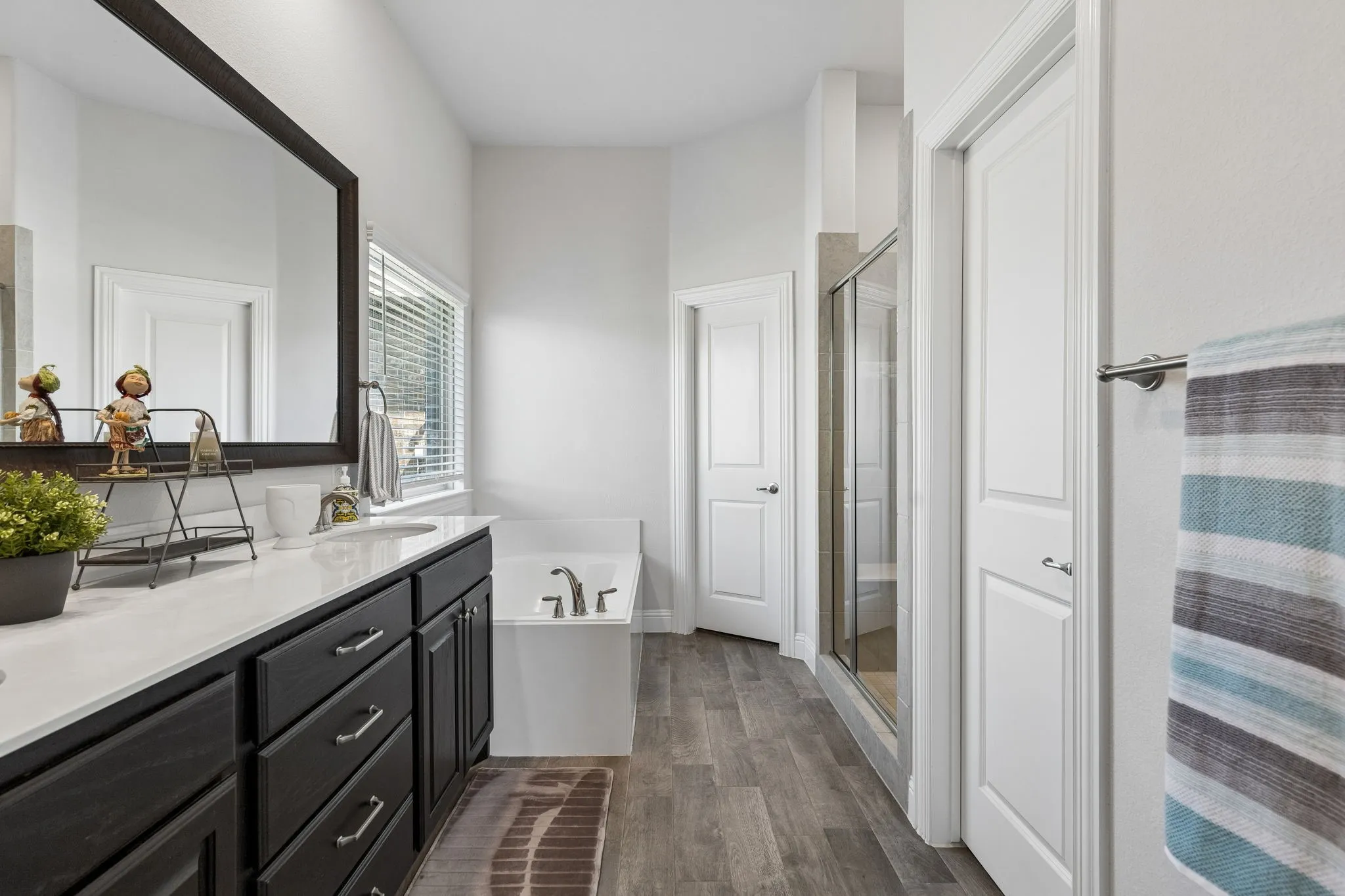 Primary Bath with soaking tub and spacious Shower with roomy Shower Seat