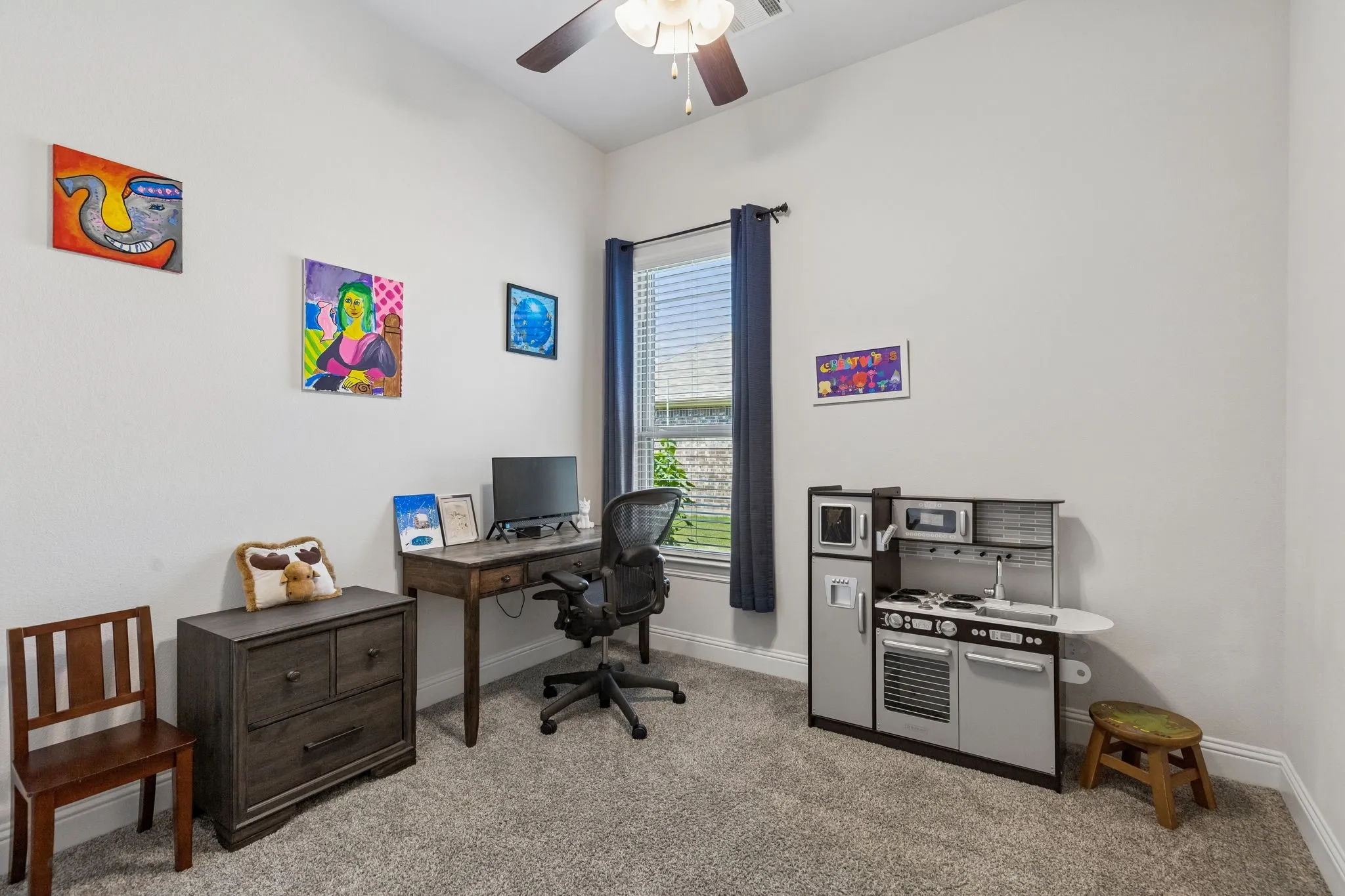 3rd spacious secondary bedroom downstairs currently being utilized as a childrens retreat
