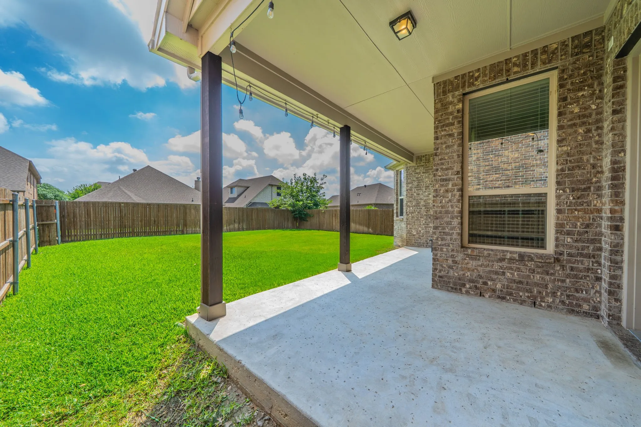 You'll love lounging or grilling and the covered back patio!