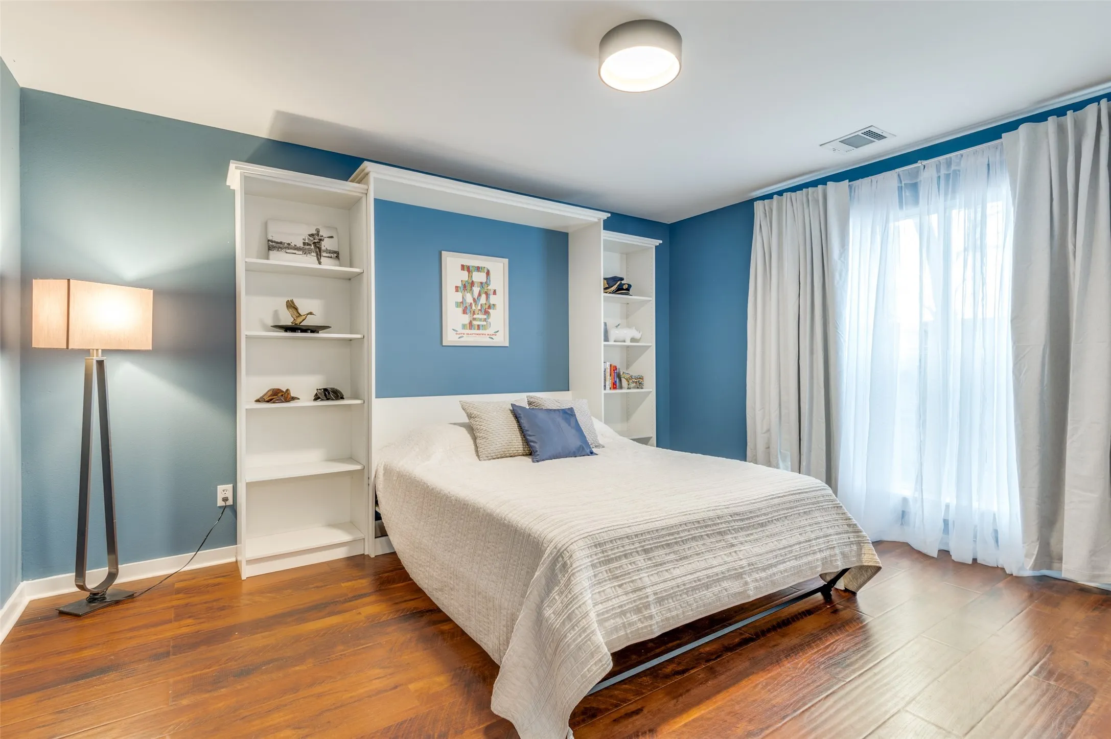Versatile first floor flex space with full bath and walk in shower, offering guest suite or office potential