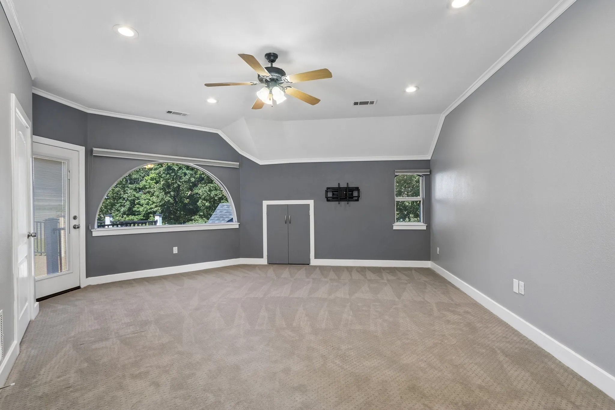 Second floor game room with balcony access