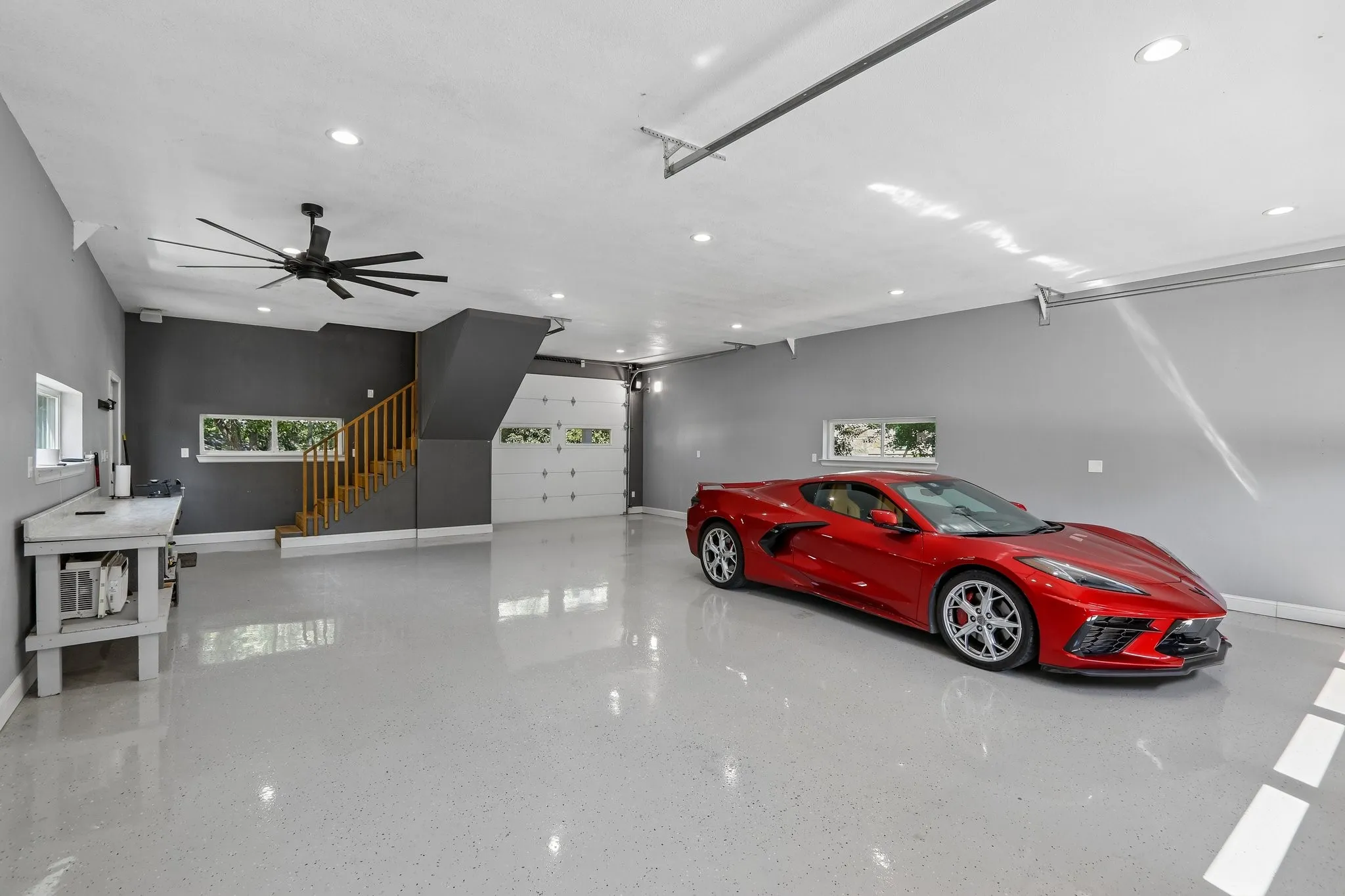 Pull through garage with 9-foot doors. Abundant second floor storage