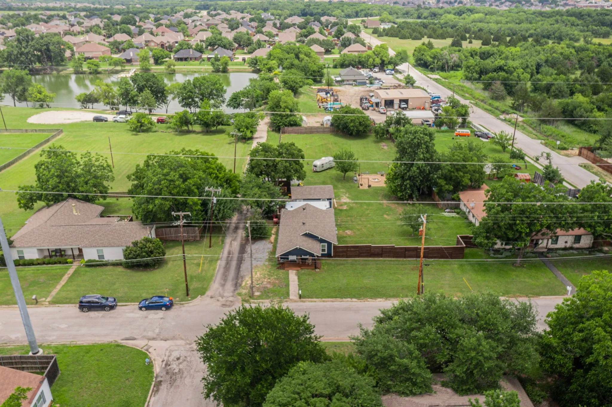 Welcome to an Amazing.76 size lot backing up to the beautiful Lake City Park of Royse City