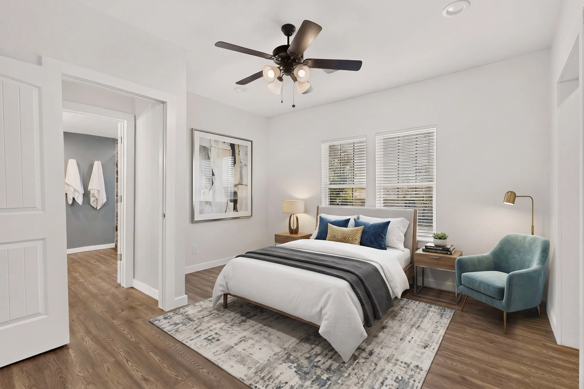 Wood-finish flooring throughout, recessed ceiling lighting, a ceiling fan with integrated lighting, and dual windows with blinds