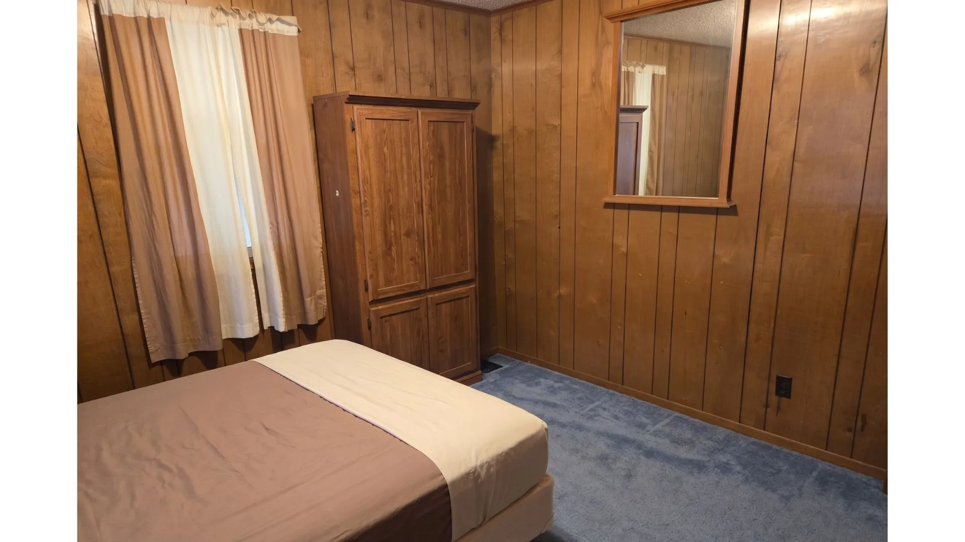 Wood paneling throughout, presenting a consistent aesthetic