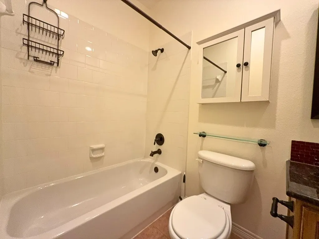 Full bath with tub-shower combo